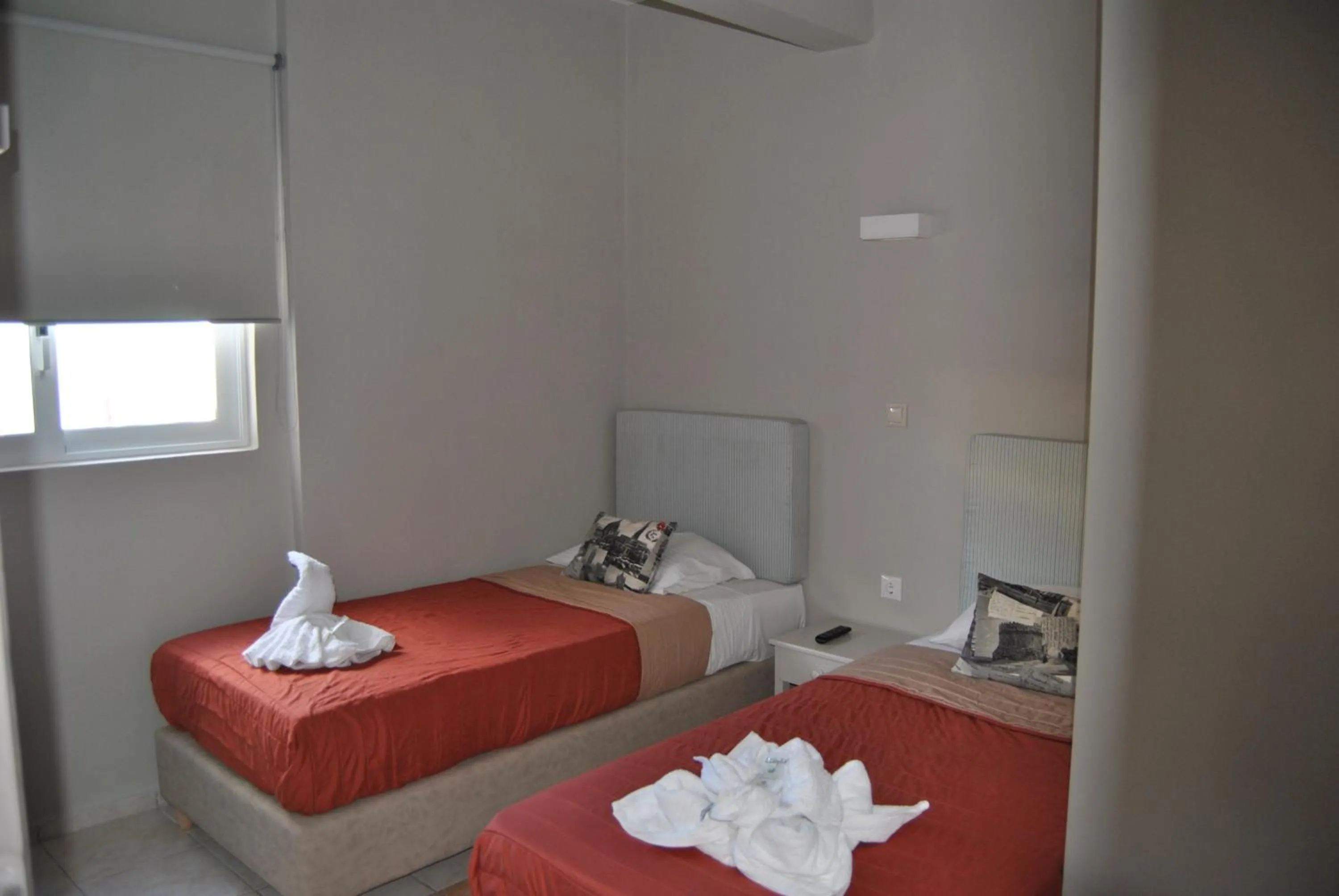 Bed in Pantheon Aparthotel