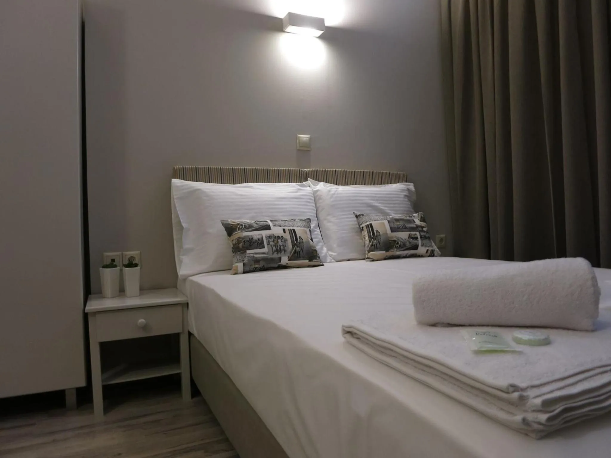 Bed in Pantheon Aparthotel