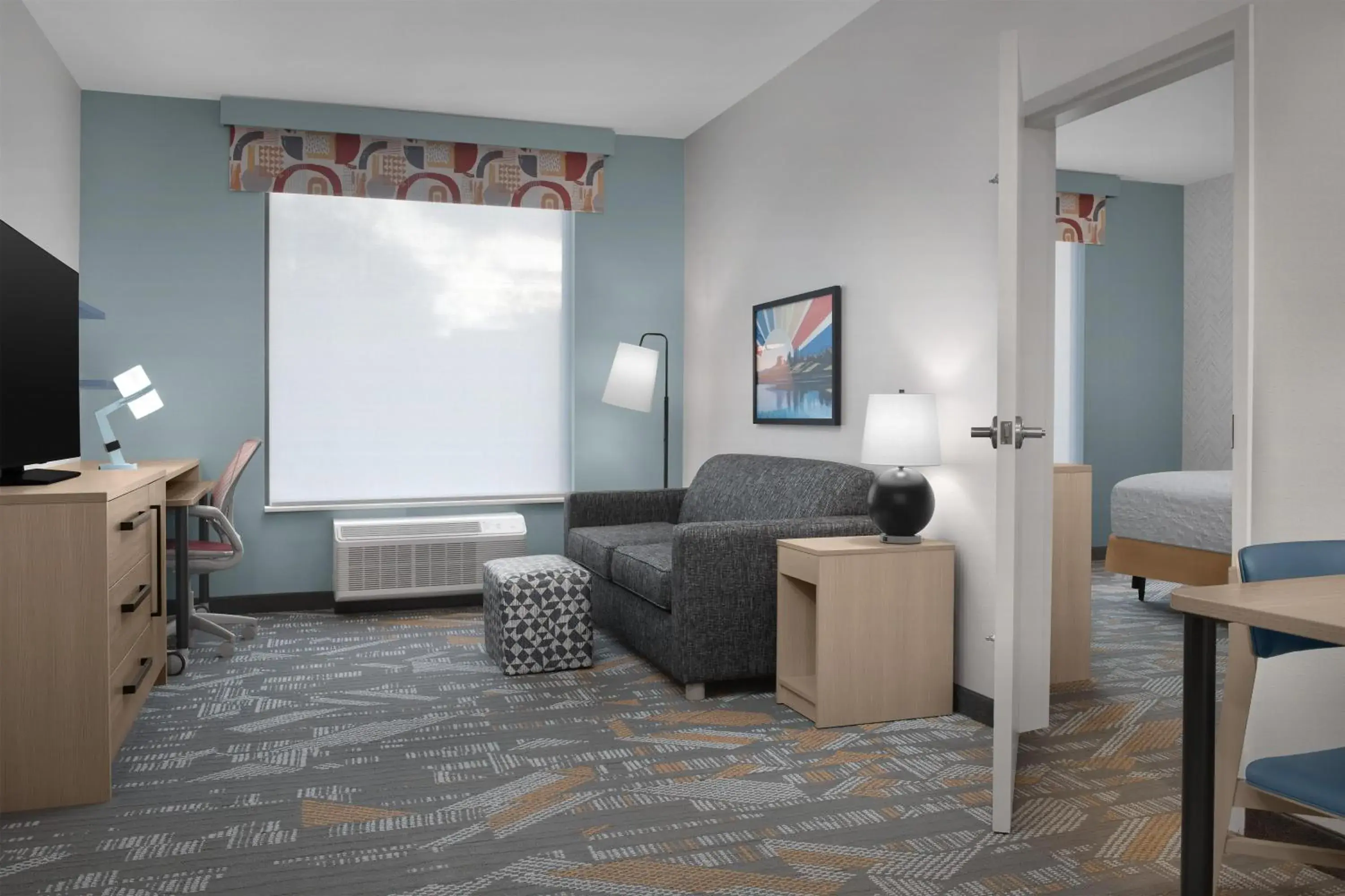 Living room in Home2 Suites By Hilton Syracuse Liverpool Airport Area Living room in Home2 Suites By Hilton Syracuse Liverpool Airport Area