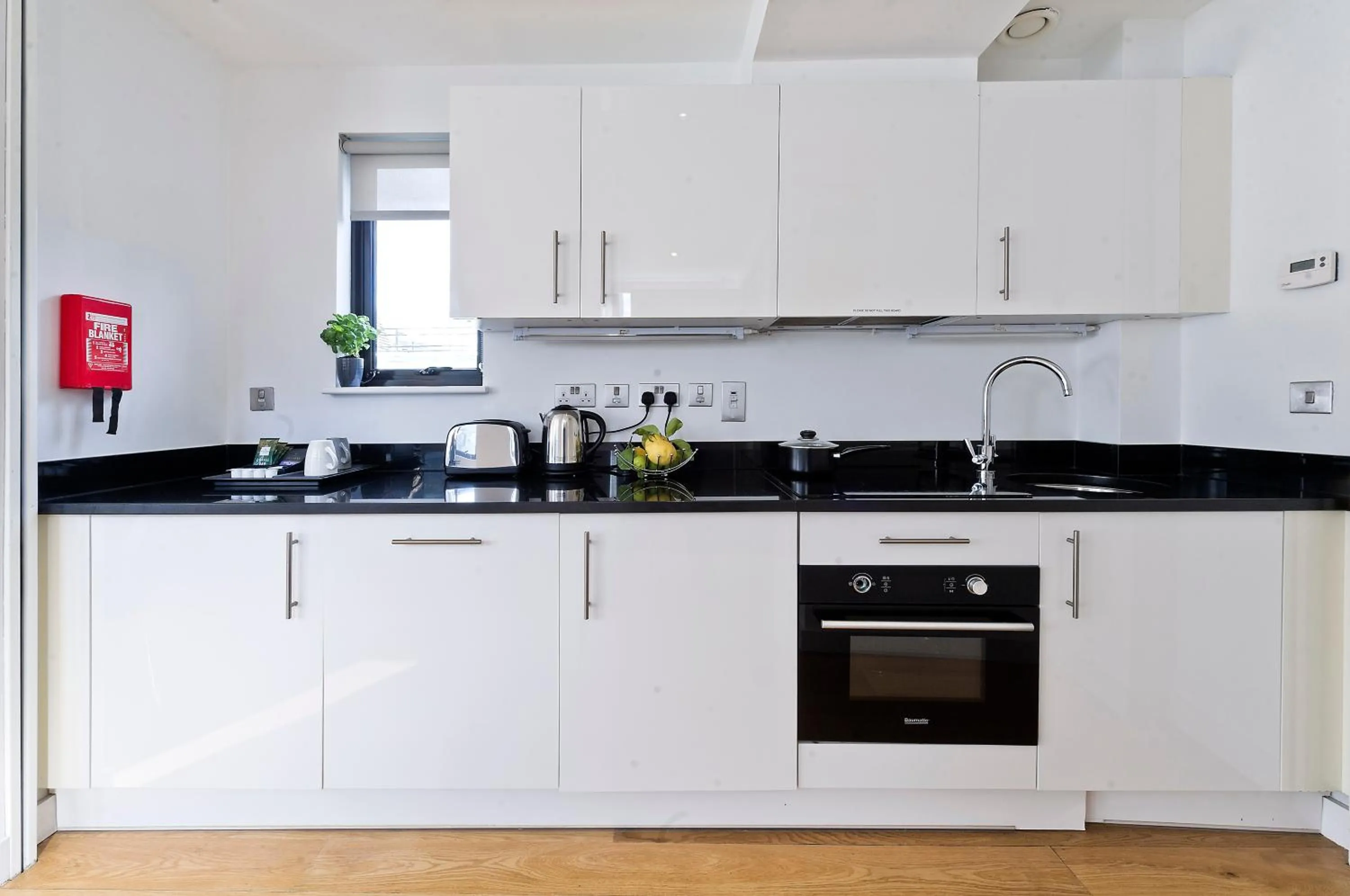 Kitchen or kitchenette in Red Lion Court by City2Stay