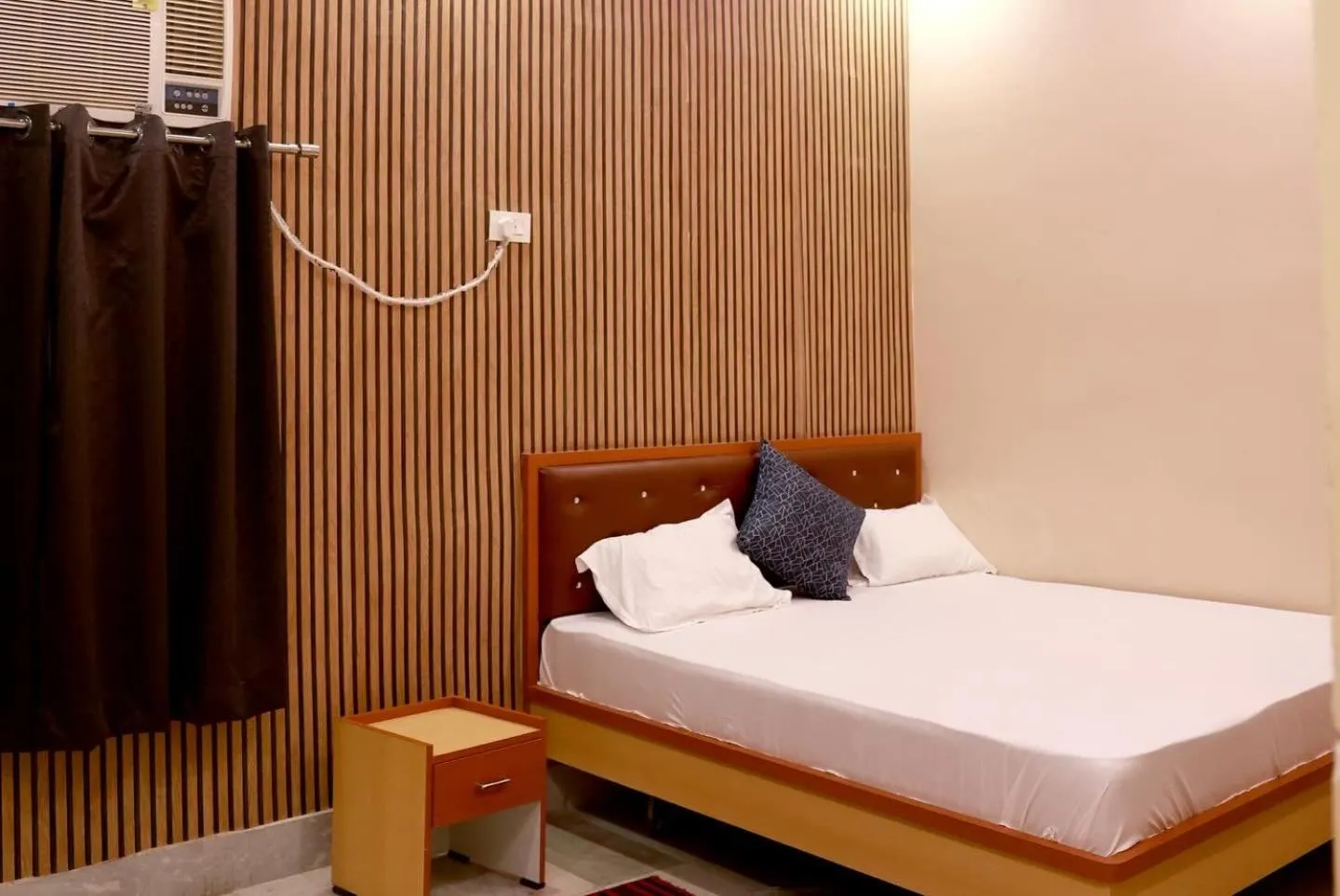 Bed in The ARL Hotels & Banquets