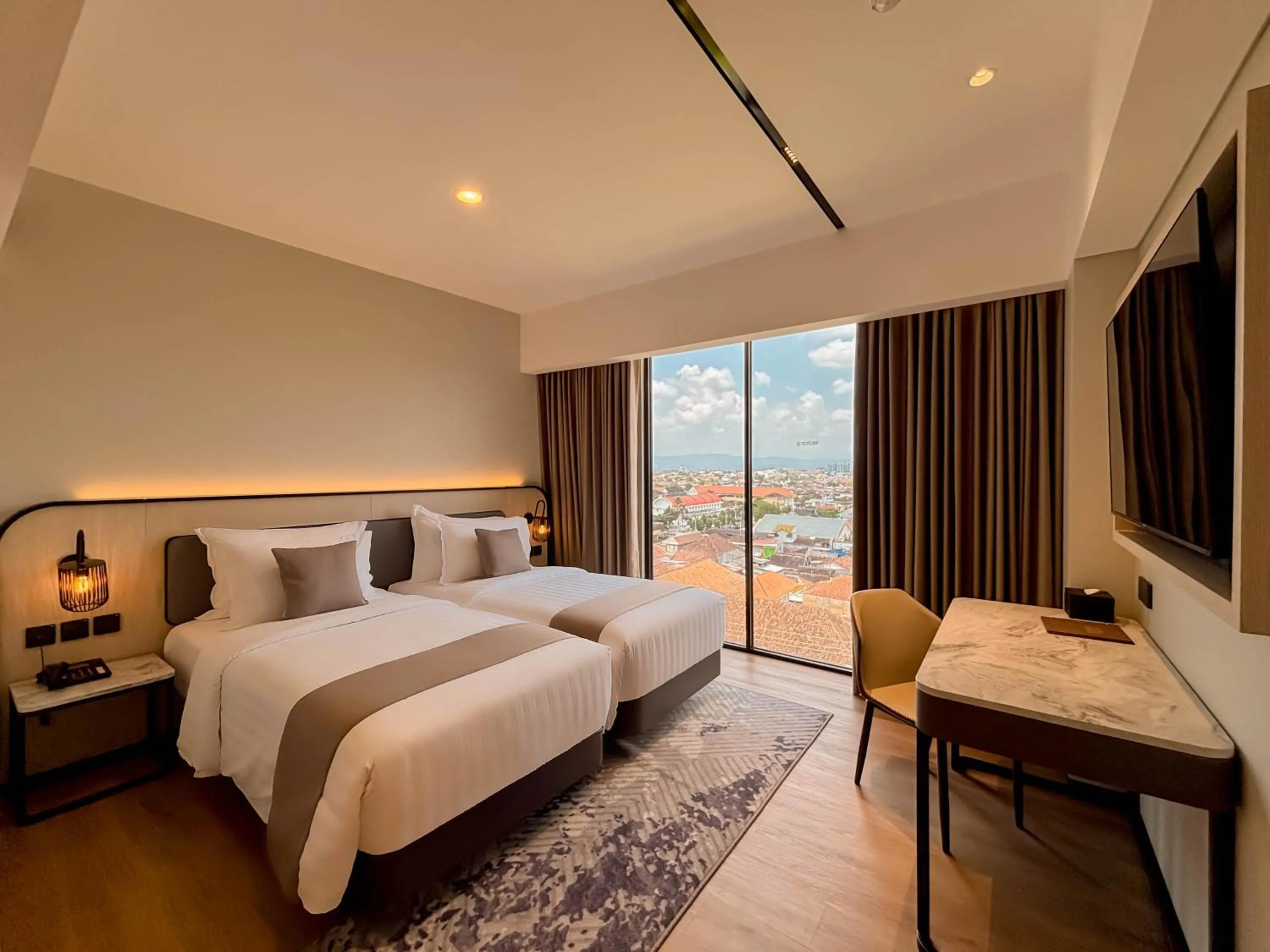 Deluxe Twin Room in FortunaSuites Malioboro Yogyakarta
