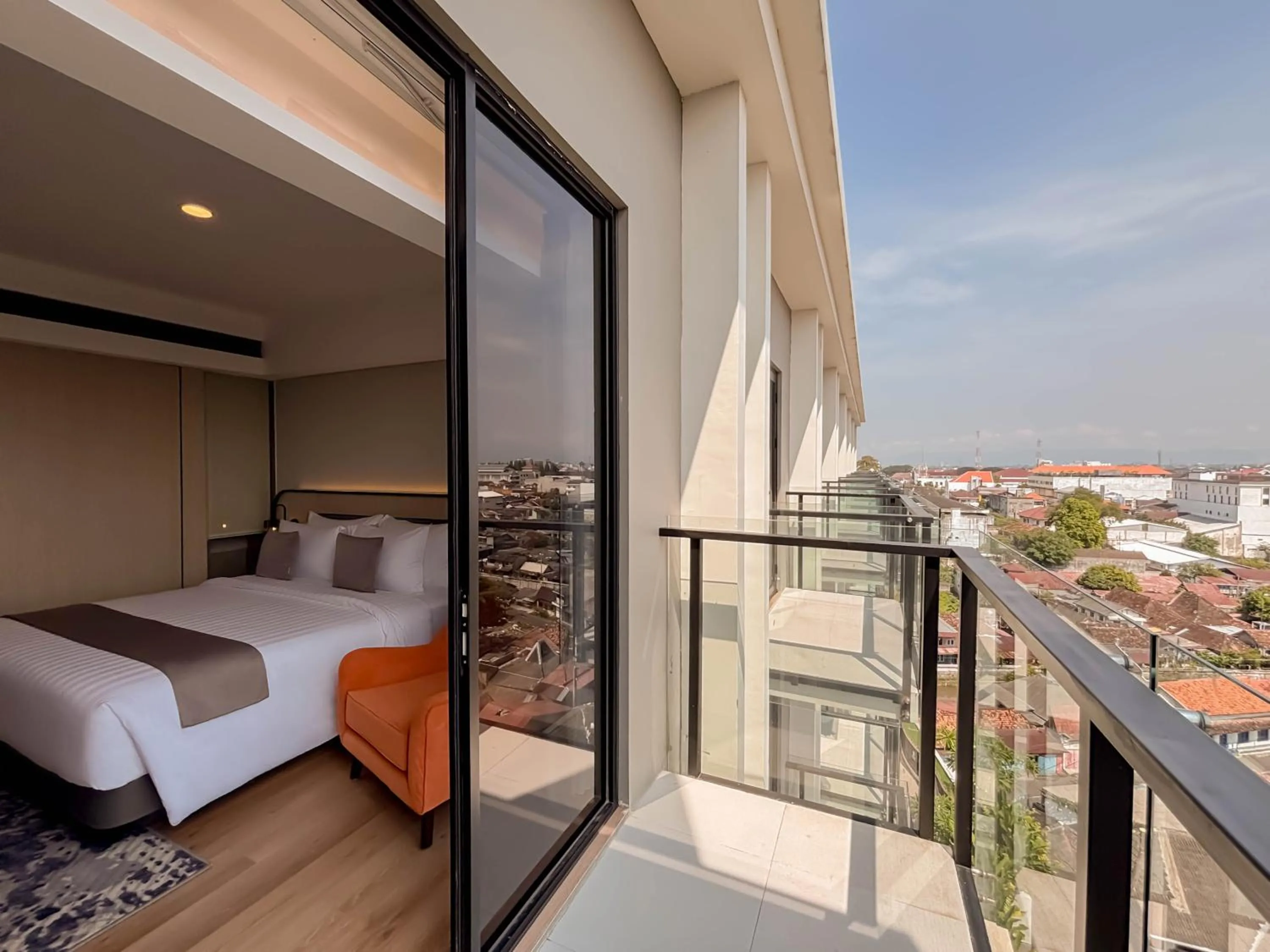 Queen Room with Balcony in FortunaSuites Malioboro Yogyakarta