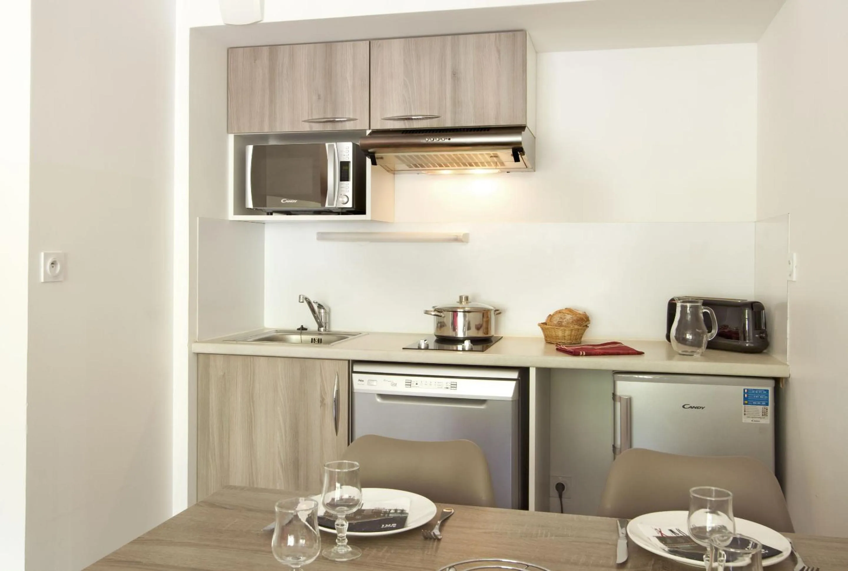 Kitchen or kitchenette in Résidence Odalys Les Balcons d'Auréa