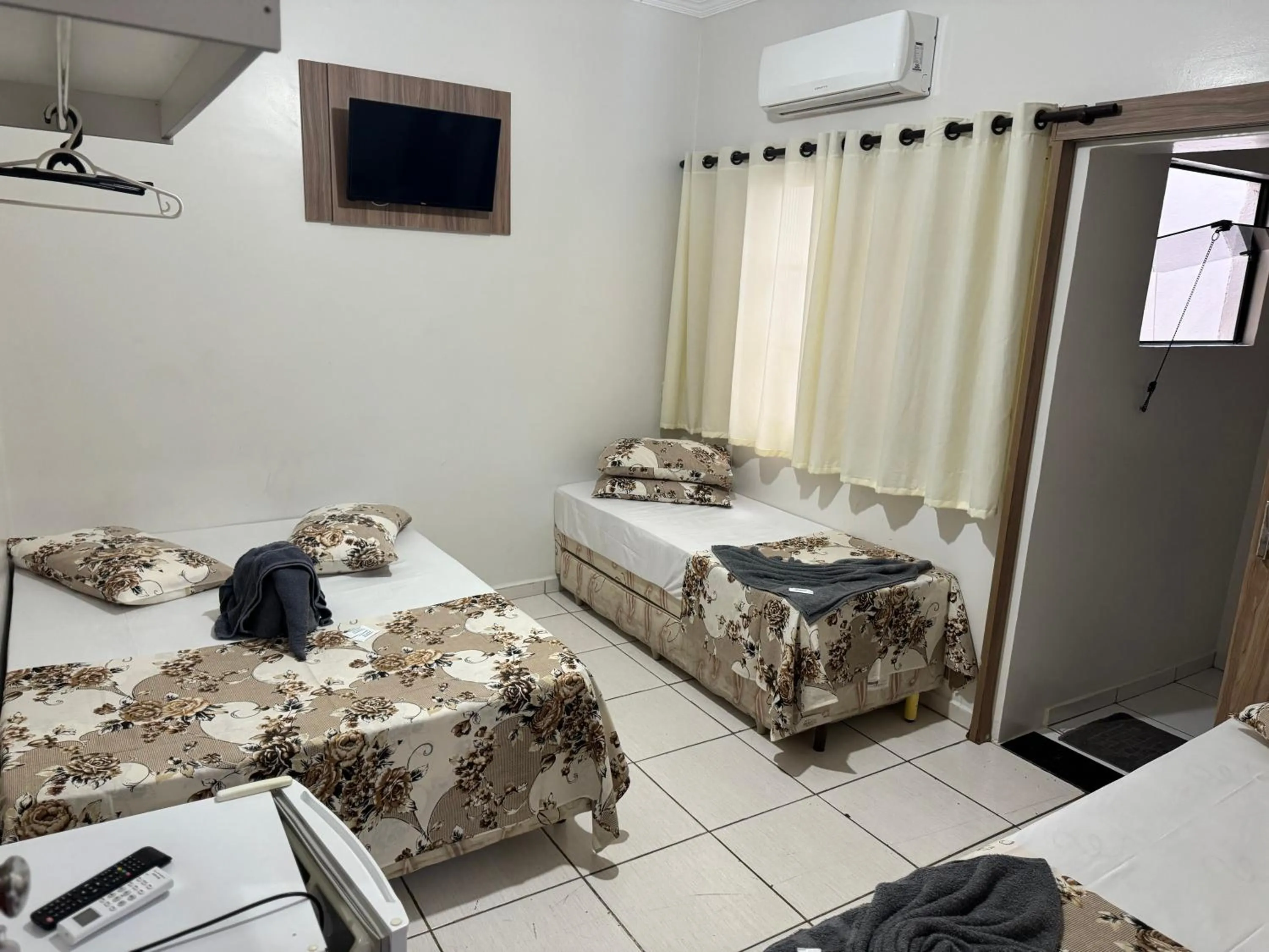 TV and multimedia, Bed in Pousada Rabake