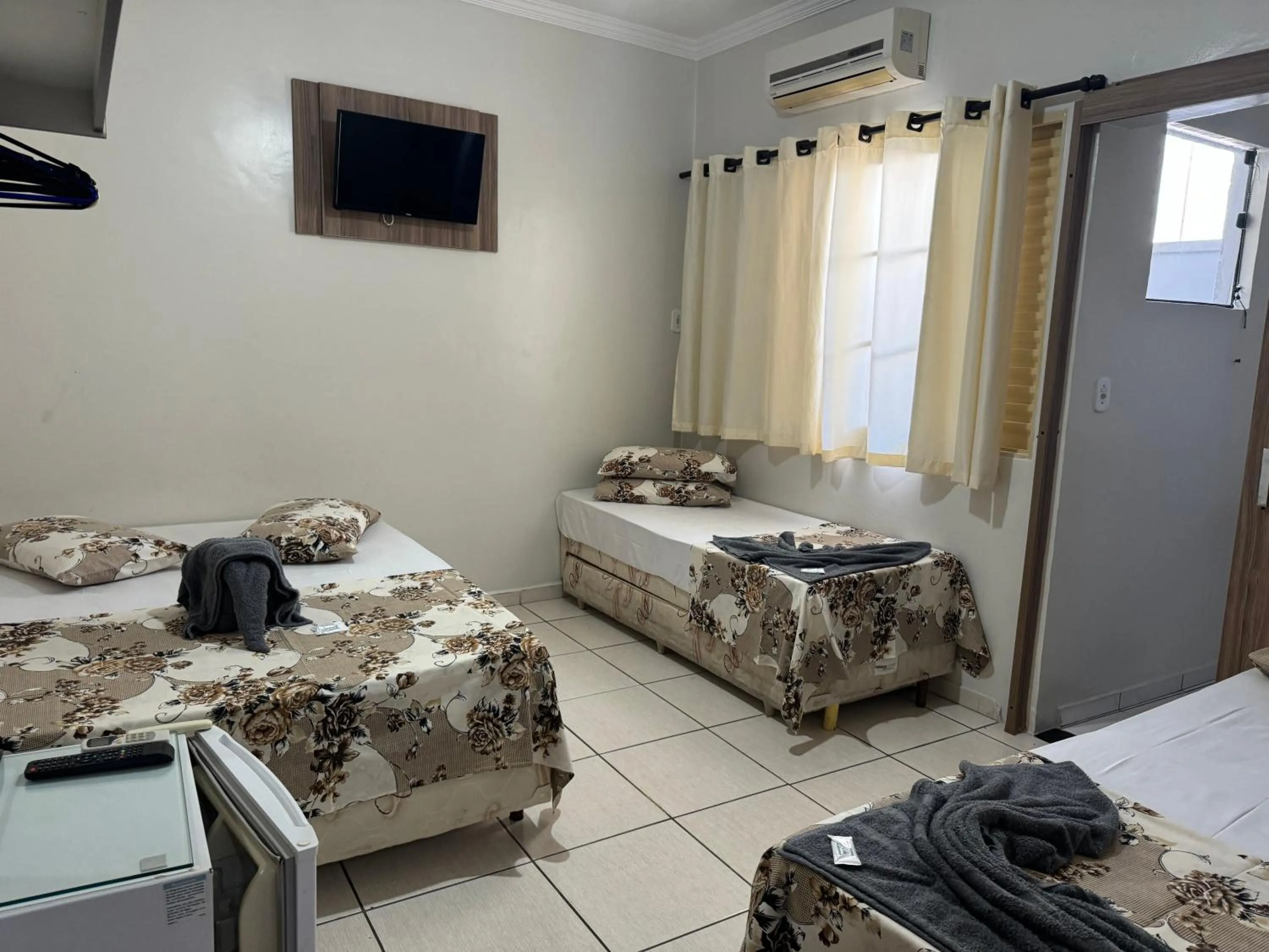 TV and multimedia, Bed in Pousada Rabake