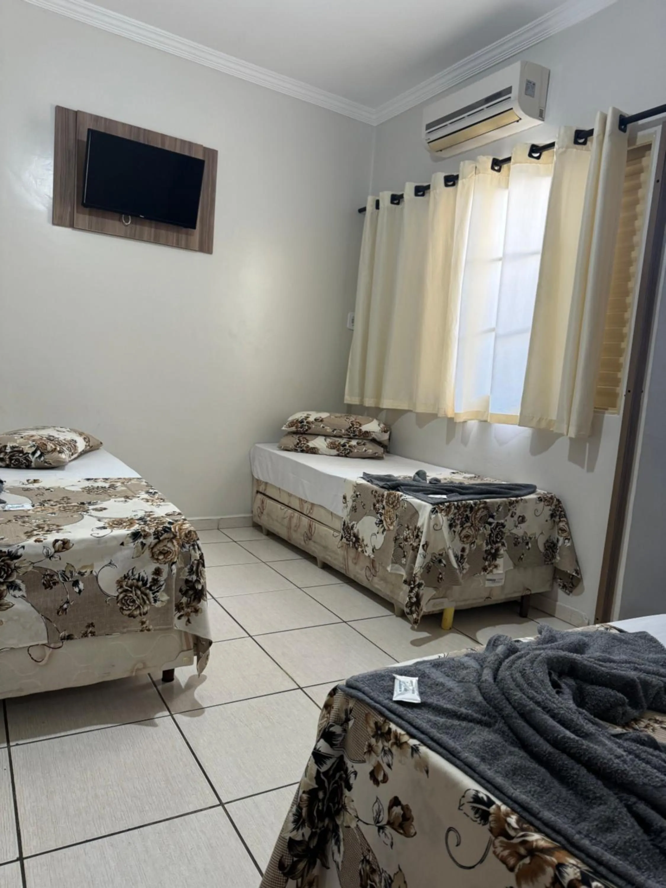 TV and multimedia, Bed in Pousada Rabake