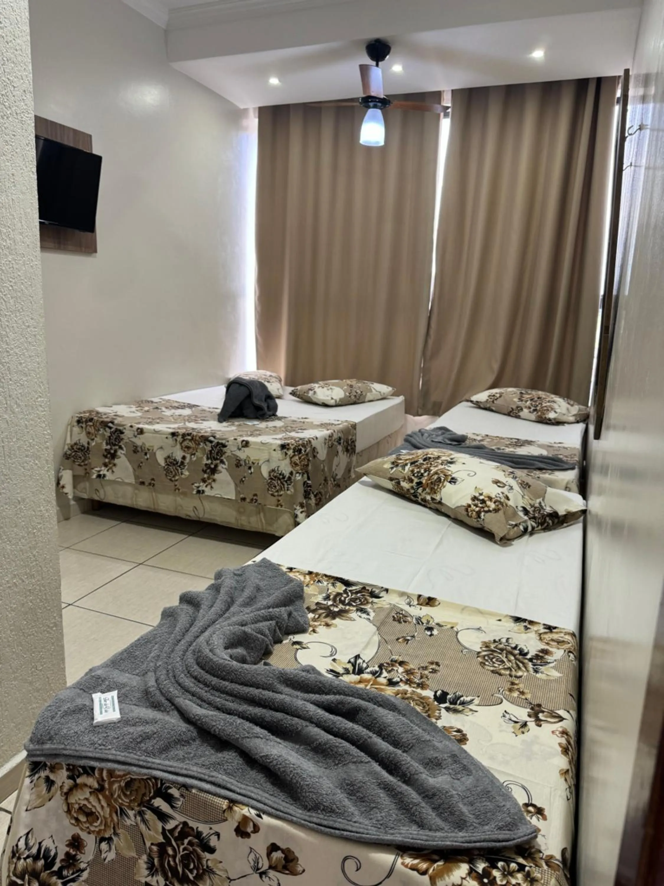 TV and multimedia, Bed in Pousada Rabake