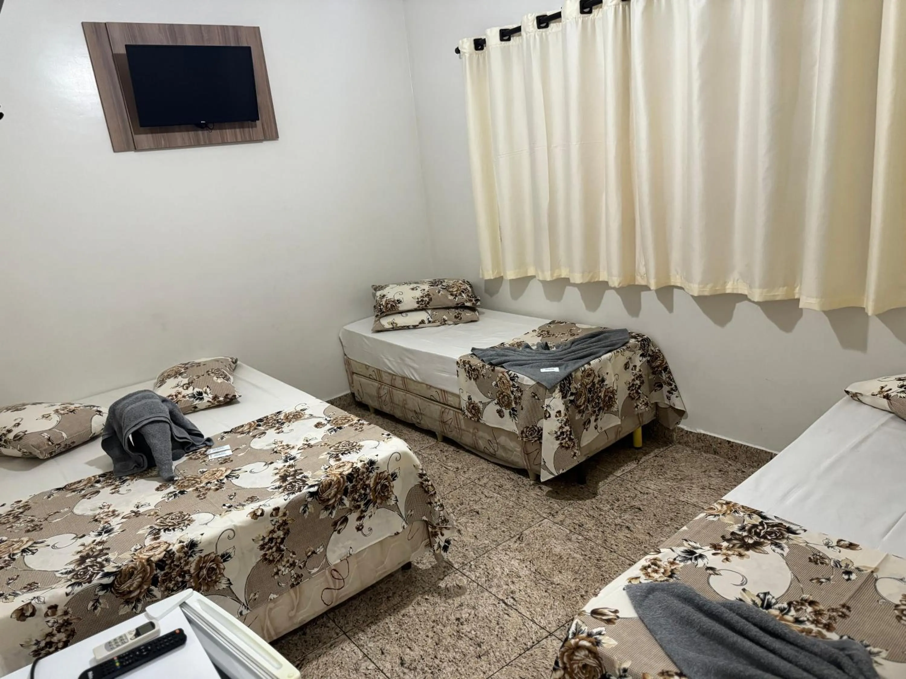 TV and multimedia, Bed in Pousada Rabake