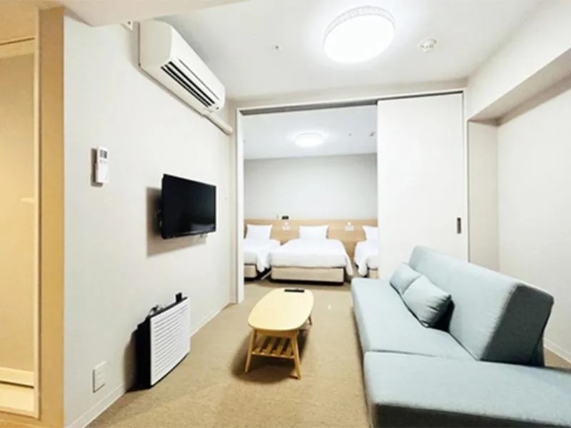 Bed in Quintessa Hotel Akita