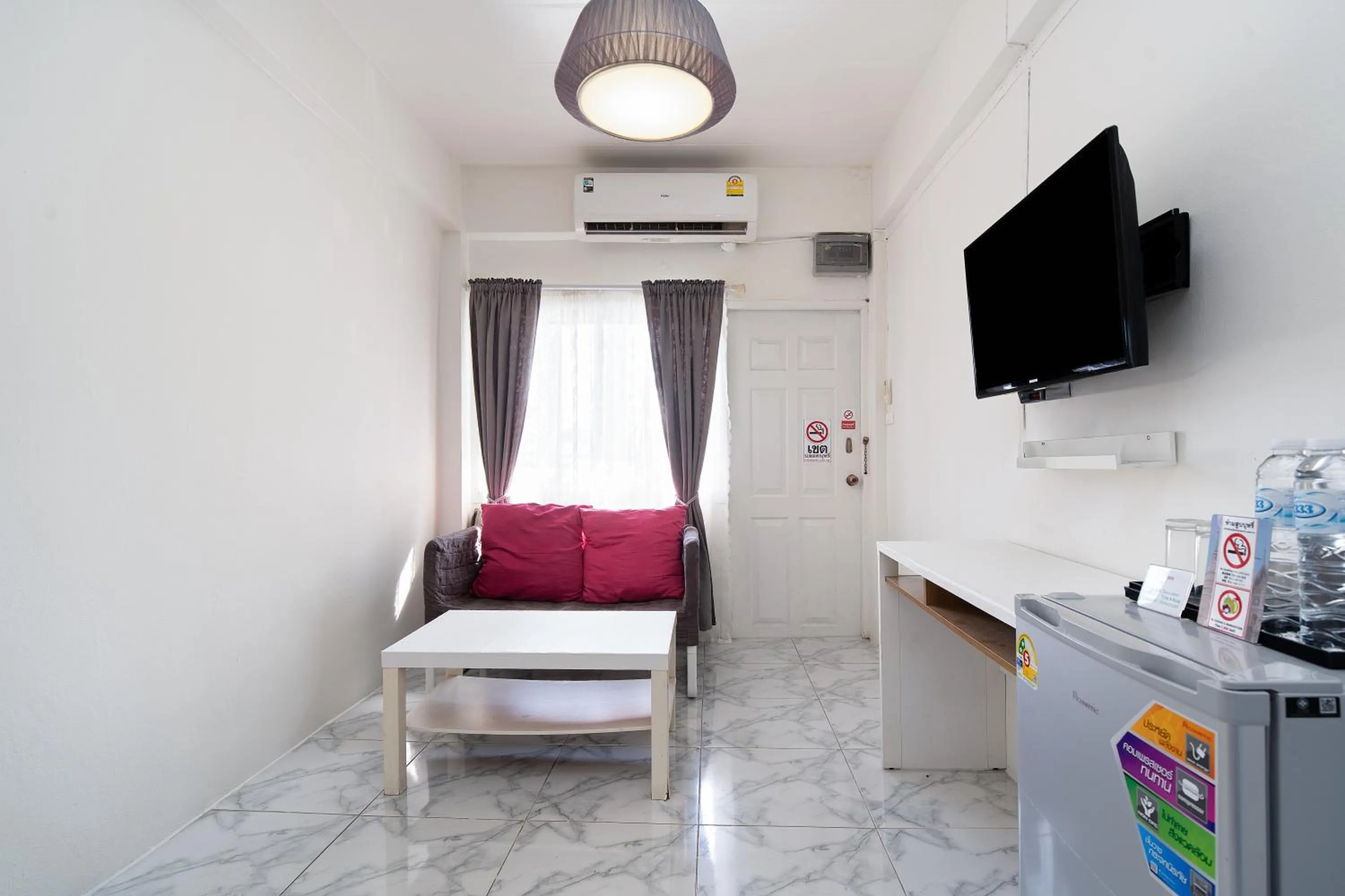 Seating area, Bed in Take a Rest Donmueang