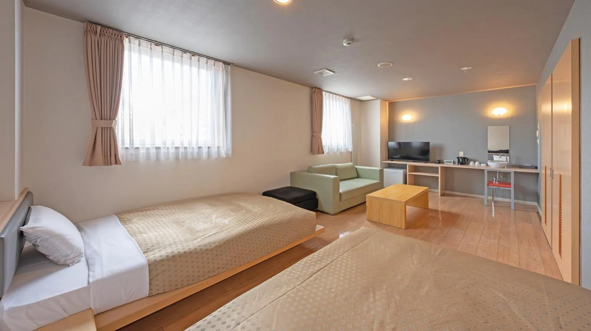 Photo of the whole room, Bed in Quintessa Hotel Fukuoka watanabedori Comic&Books
