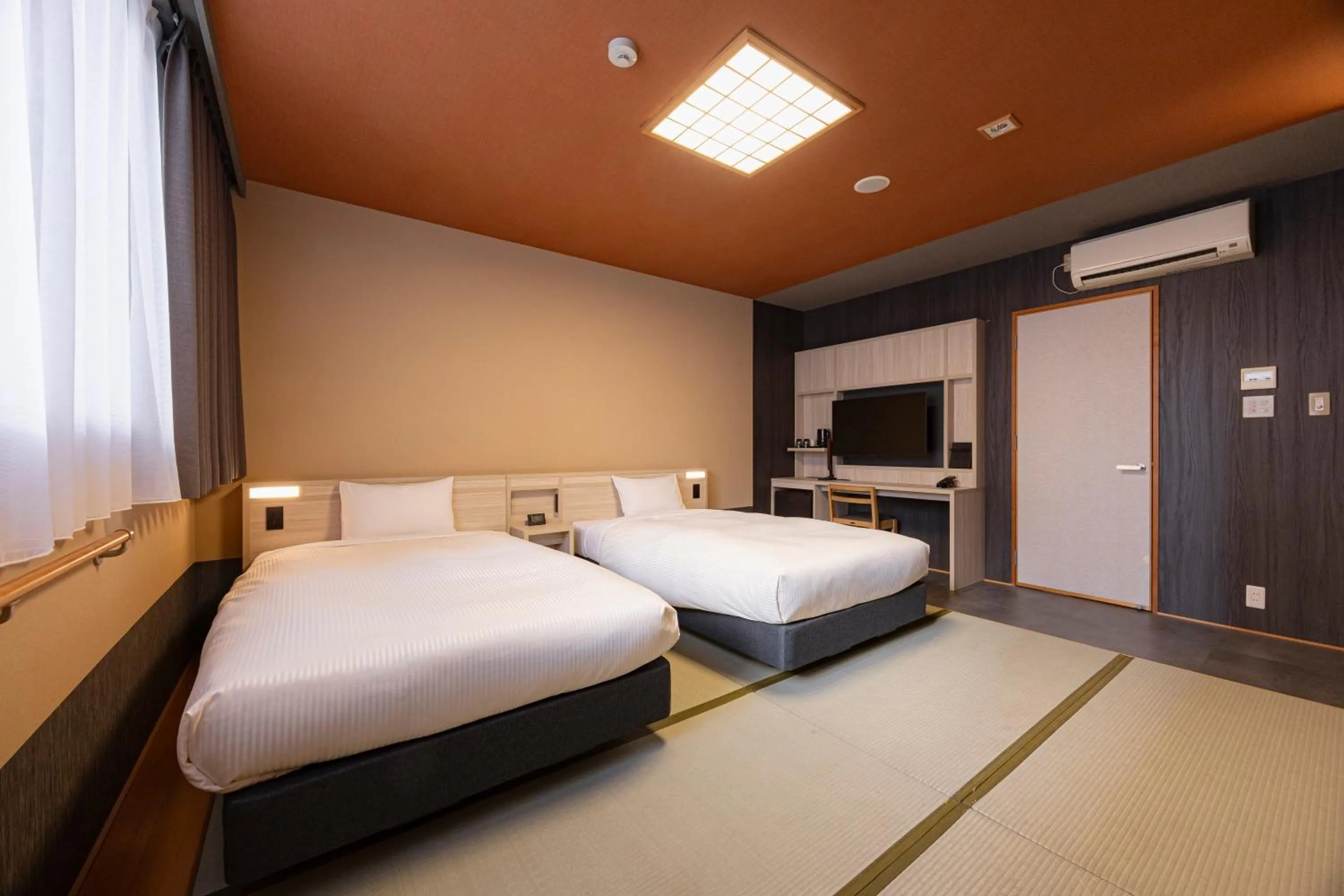 Bedroom, Bed in Quintessa Hotel Fukuoka watanabedori Comic&Books