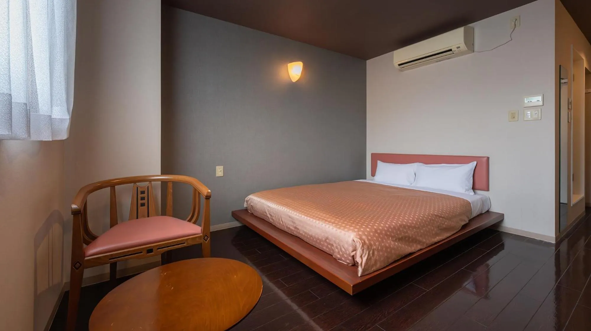 Photo of the whole room, Bed in Quintessa Hotel Fukuoka watanabedori Comic&Books