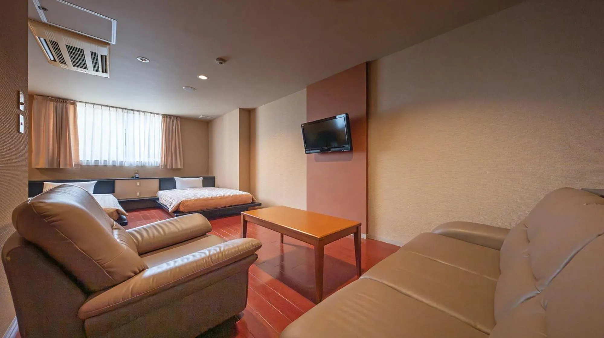 Photo of the whole room, Bed in Quintessa Hotel Fukuoka watanabedori Comic&Books