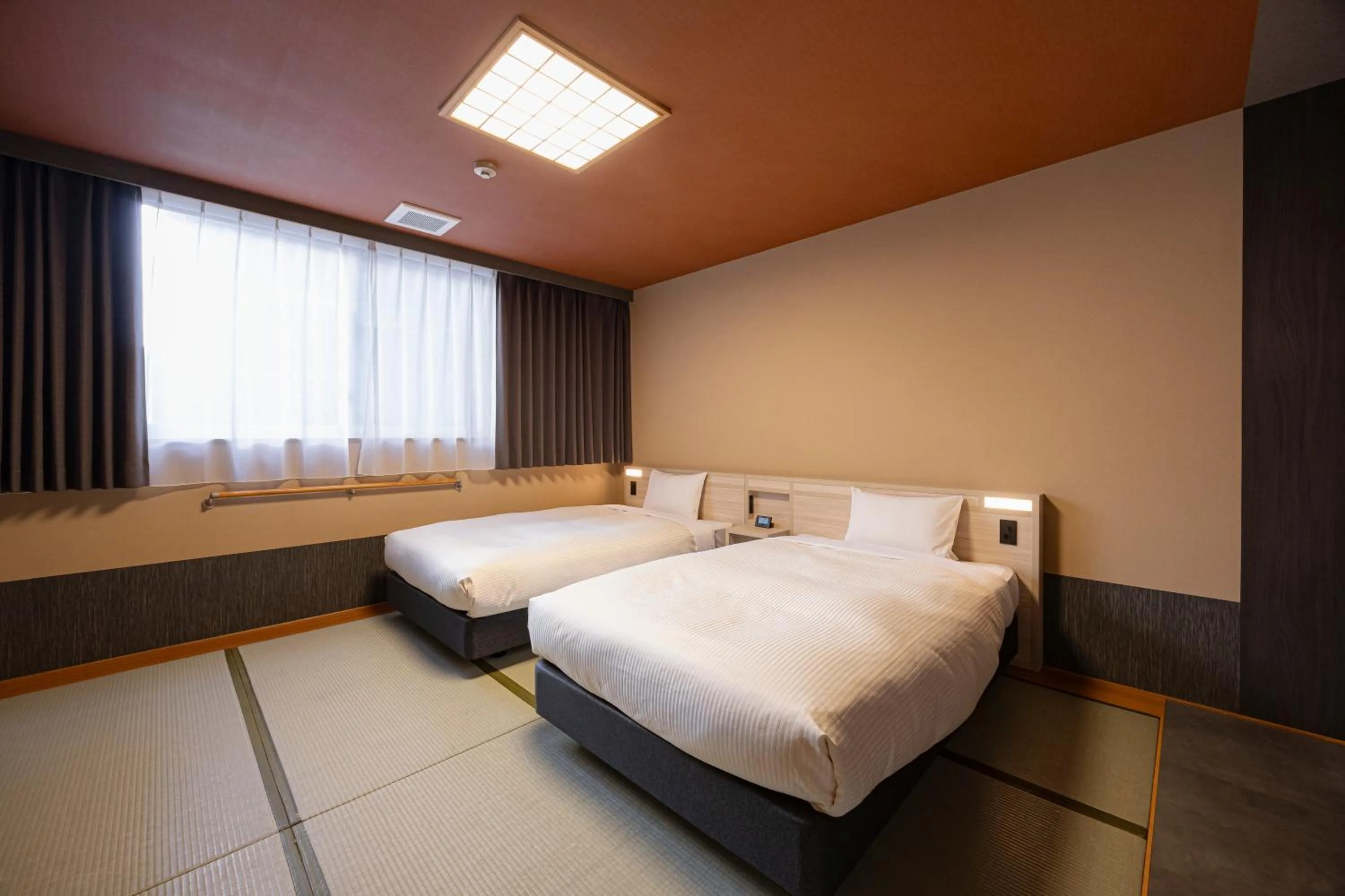 Bedroom, Bed in Quintessa Hotel Fukuoka watanabedori Comic&Books