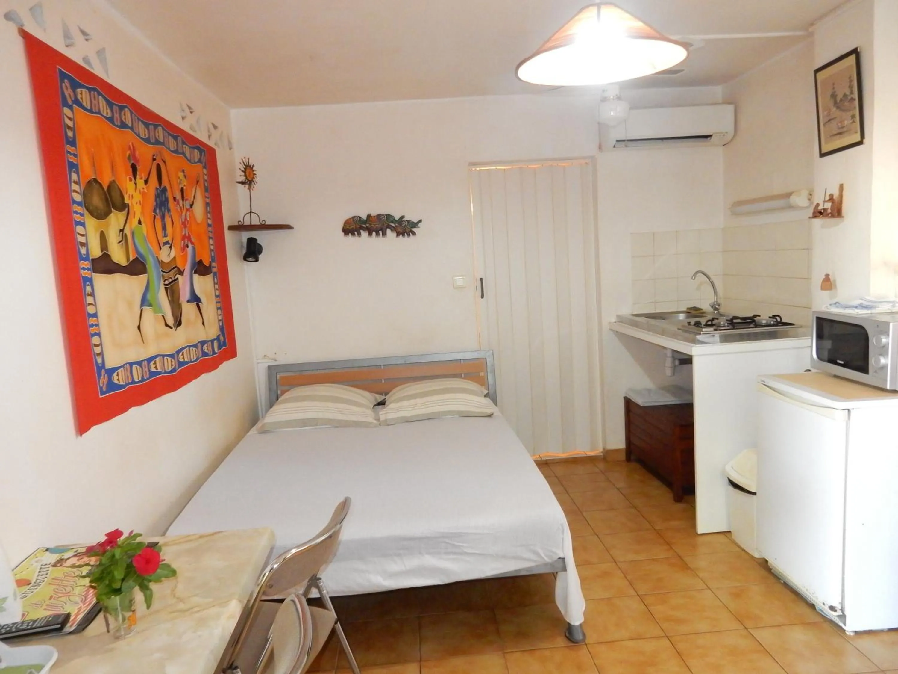 Kitchen or kitchenette, Bed in Sarl Mayoume