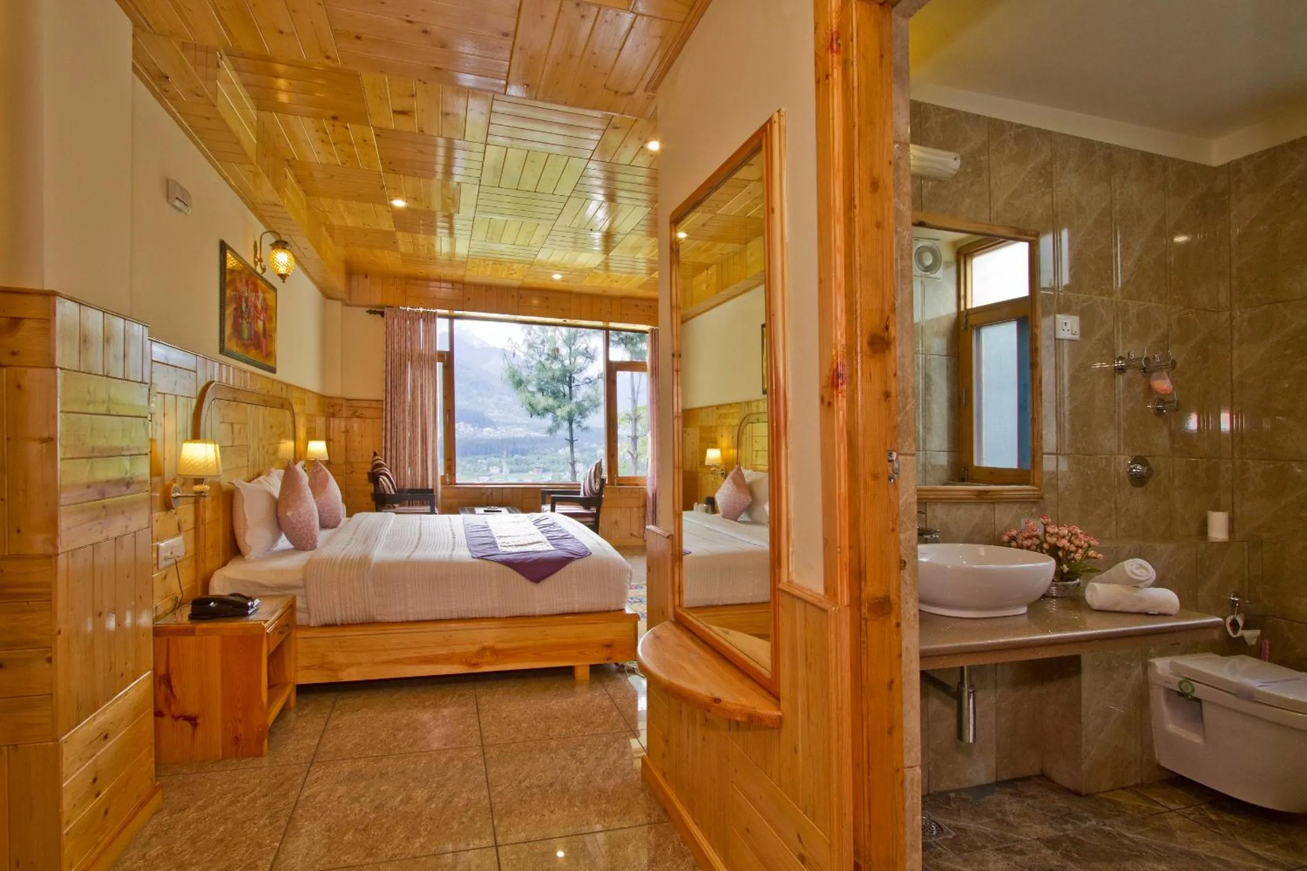 Bed in Foghills Cottages Manali