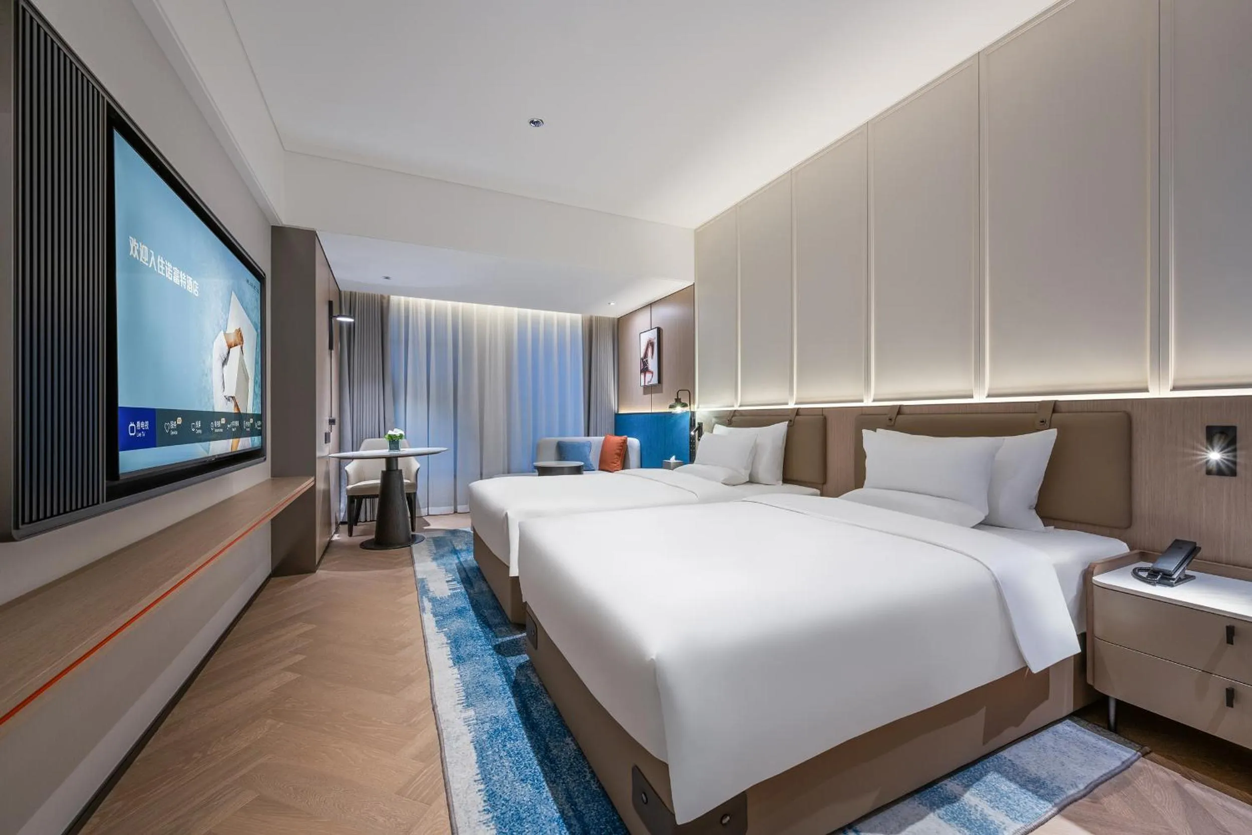 Communal lounge/ TV room, Bed in Novotel Hangzhou Yuhang