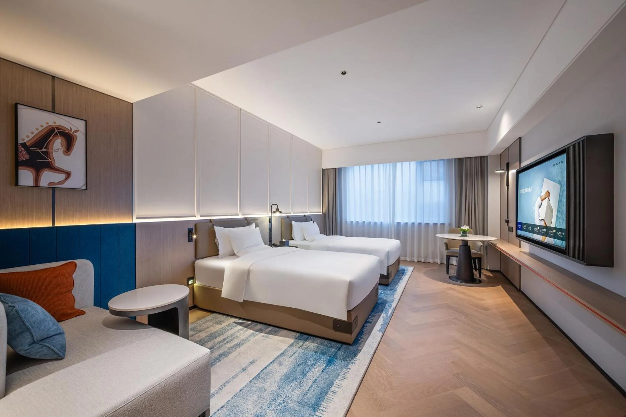 Communal lounge/ TV room, Bed in Novotel Hangzhou Yuhang