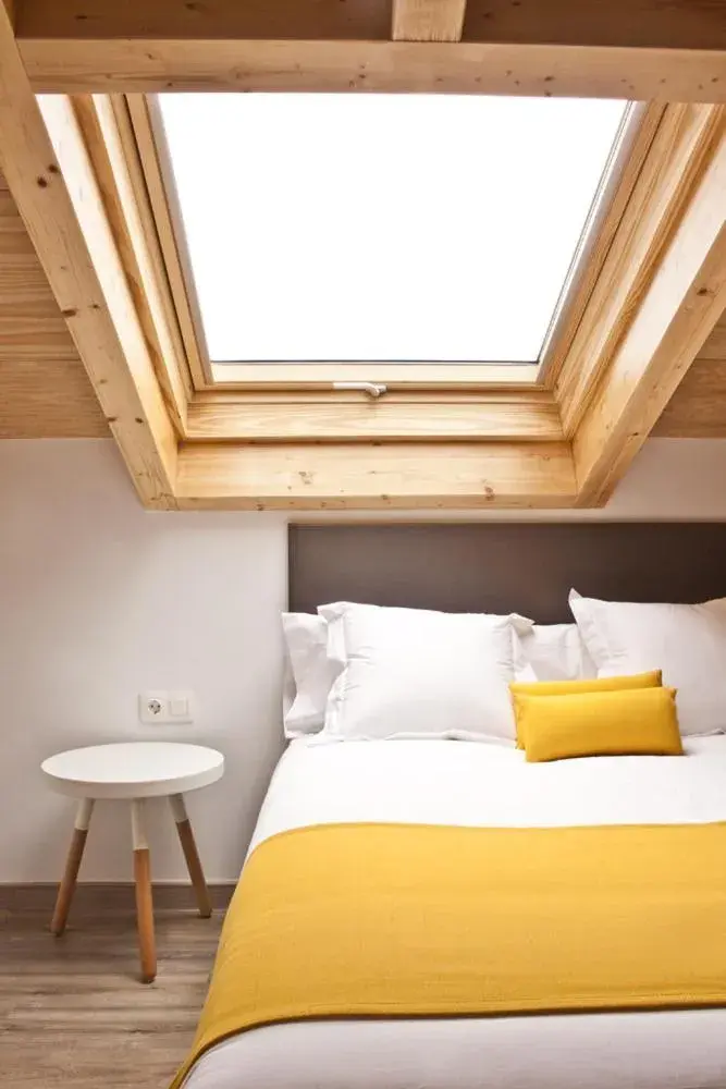 Decorative detail, Bed in Lux Apartamentos Santiago Decorative detail, Bed in Lux Apartamentos Santiago