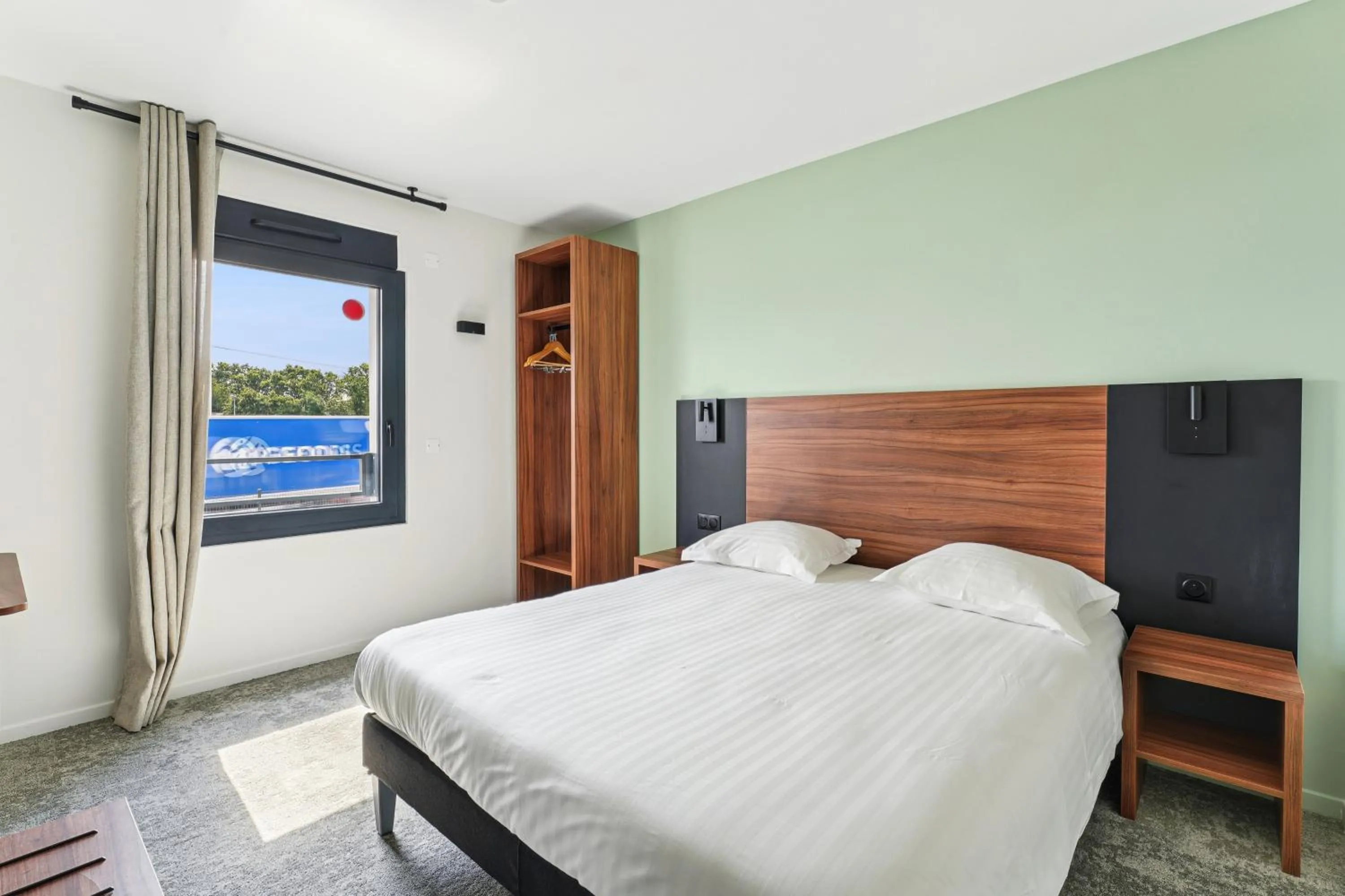 Bed in Hôtel Akena Pierrelaye