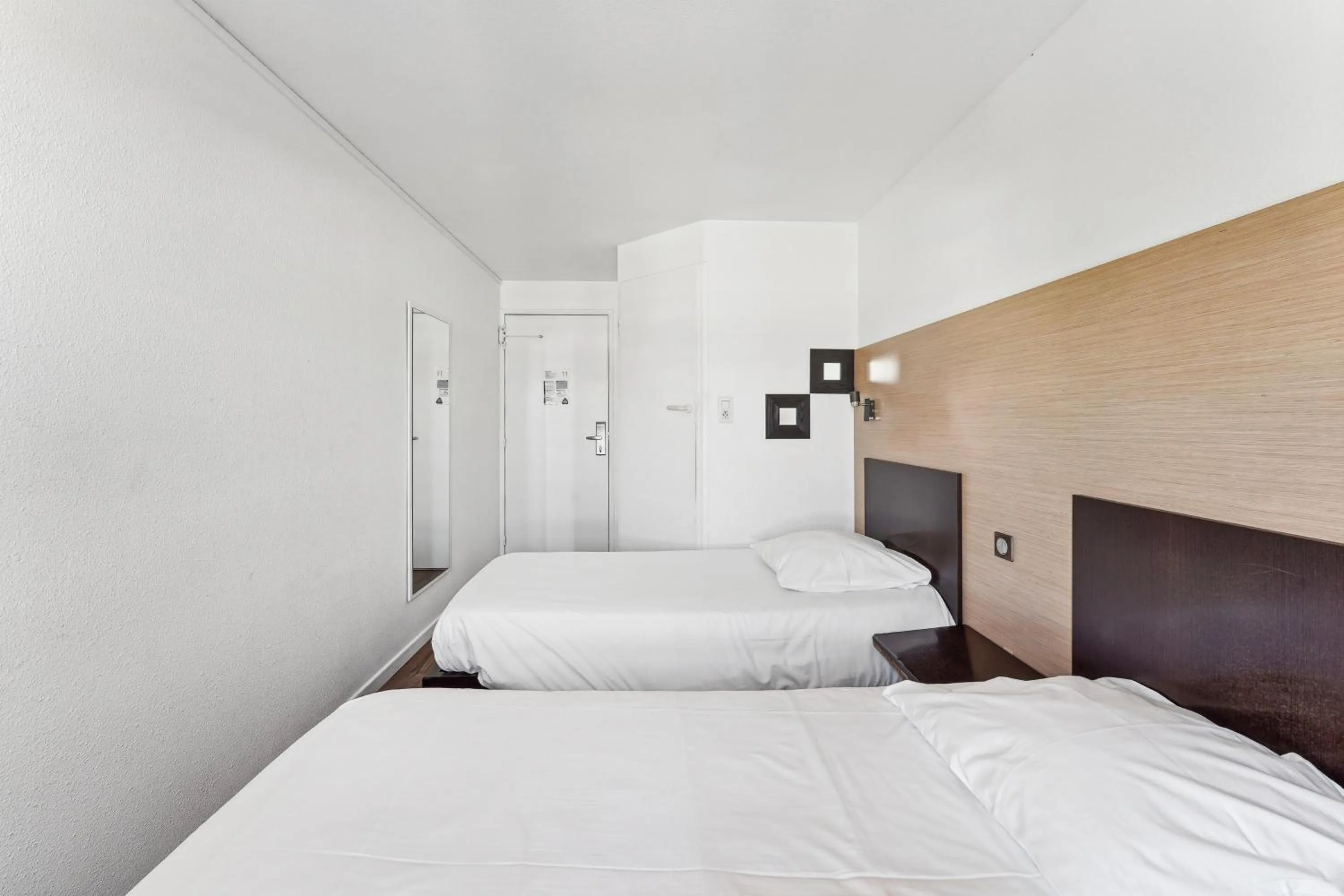 Bed in Hôtel Akena Pierrelaye