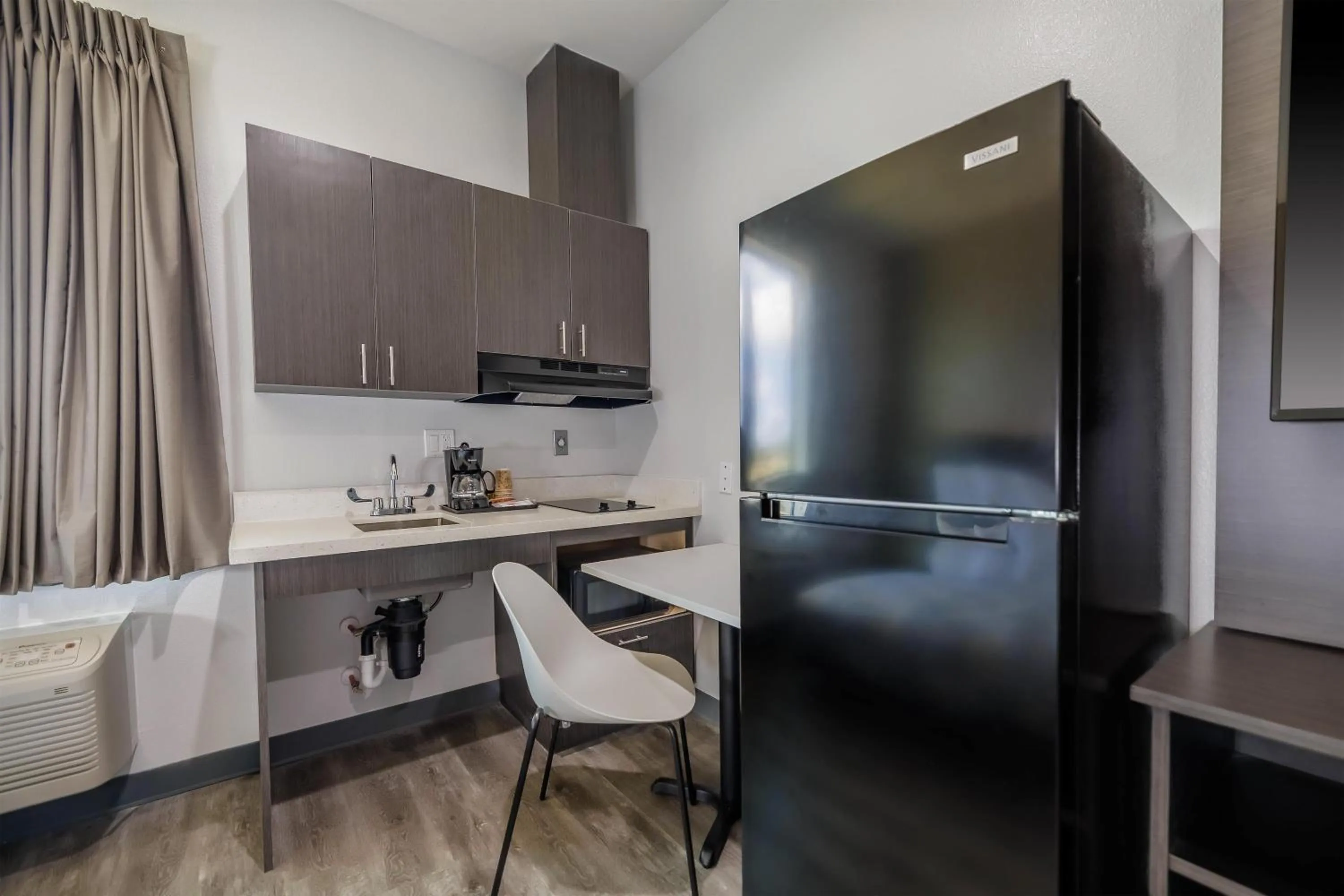 Kitchen or kitchenette in Studio 6 Giddings