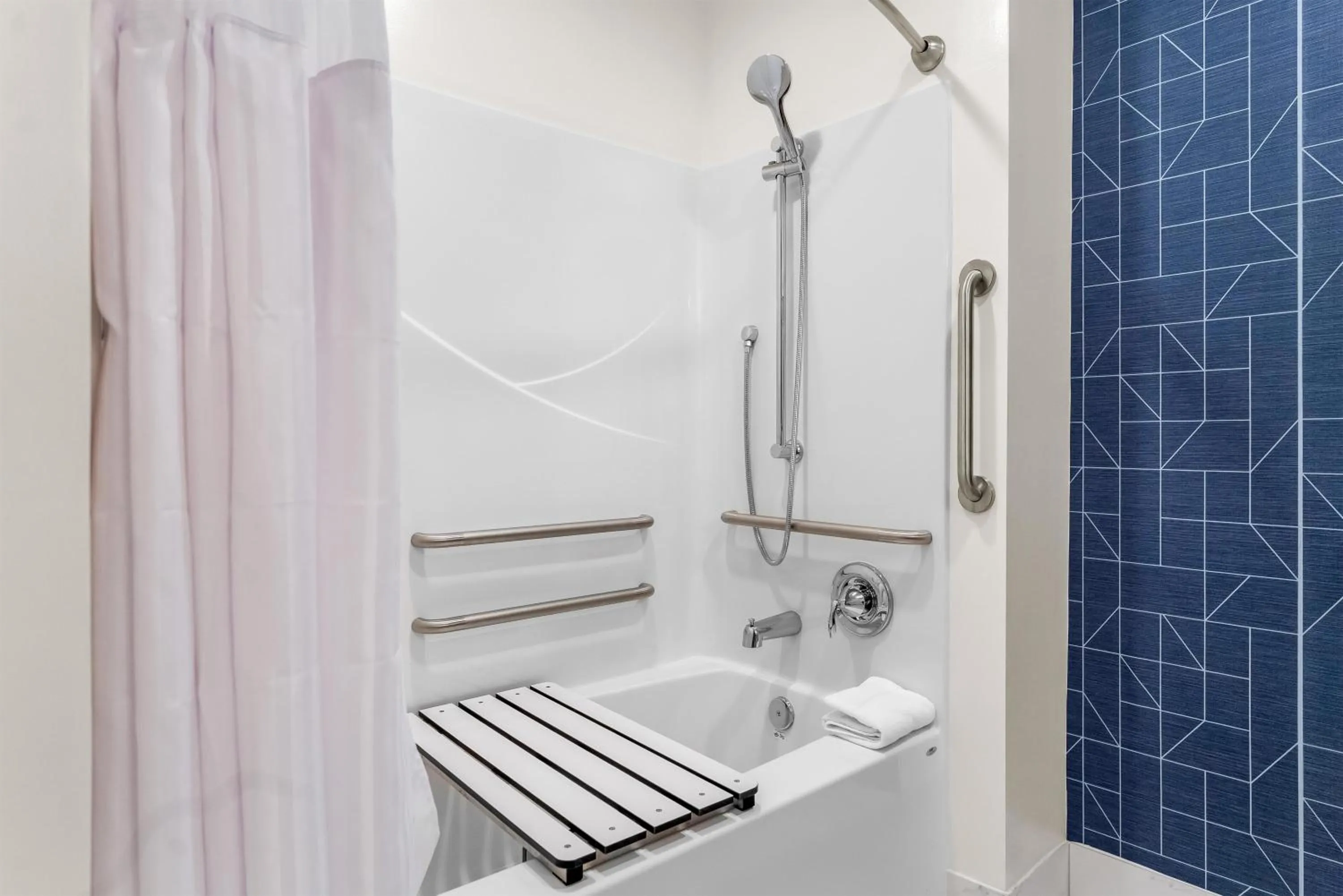 Bathroom in Spark by Hilton Essex Junction