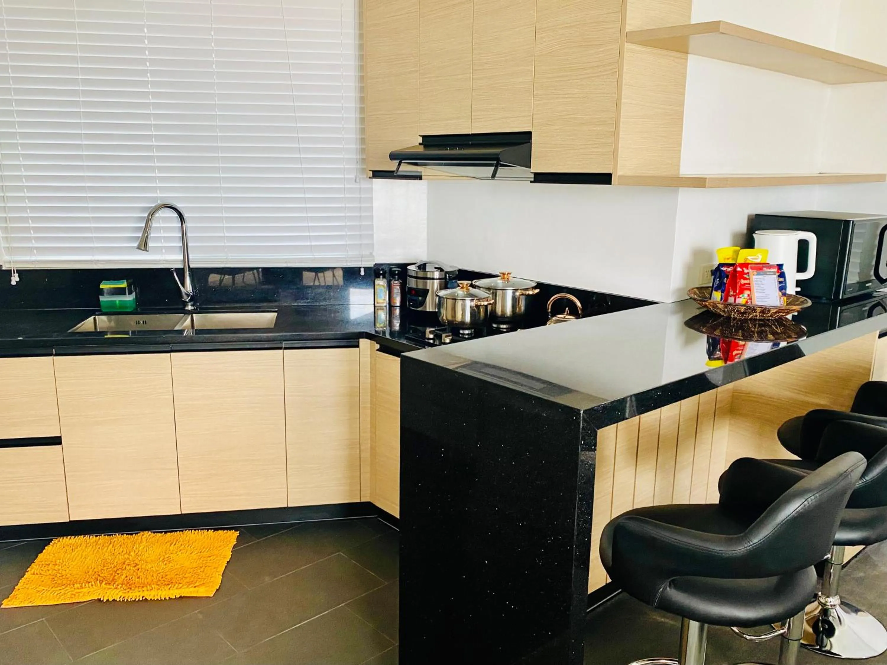 Kitchen or kitchenette in Lalaguna Villas Luxury Dive Resort and Spa