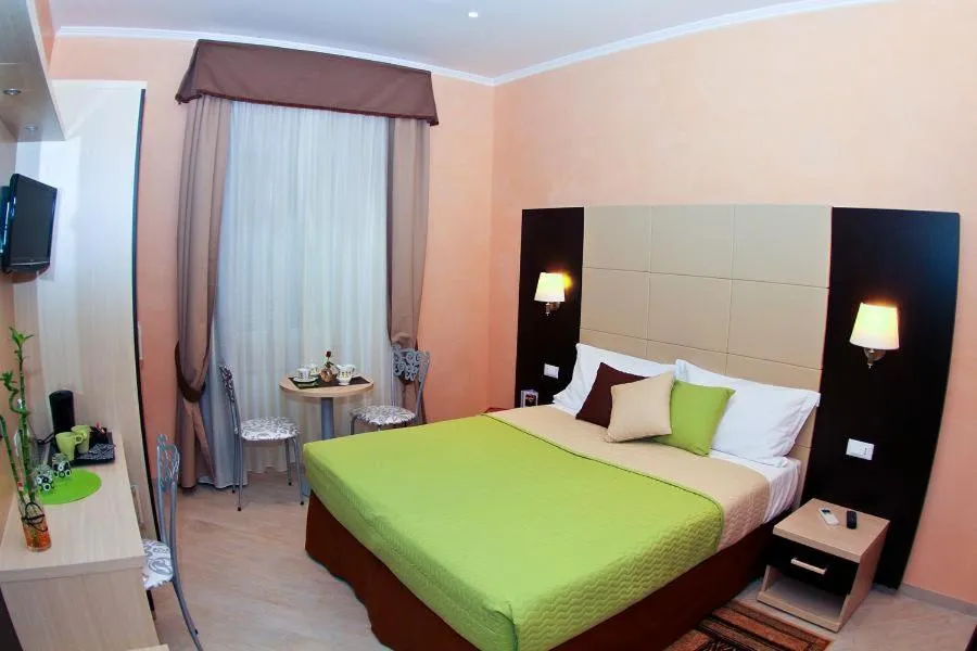 Bed in Candia Inn Vatican