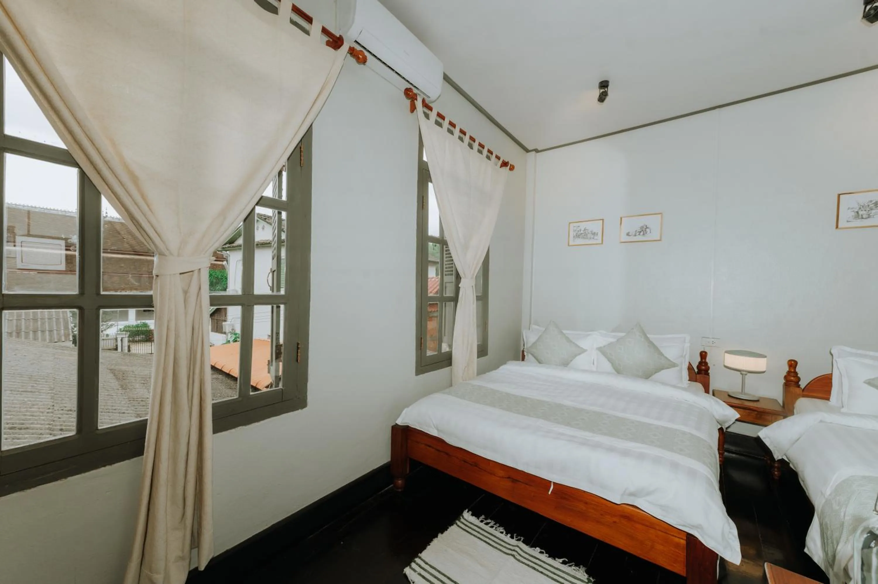 Bed in SamaiLaos Residence