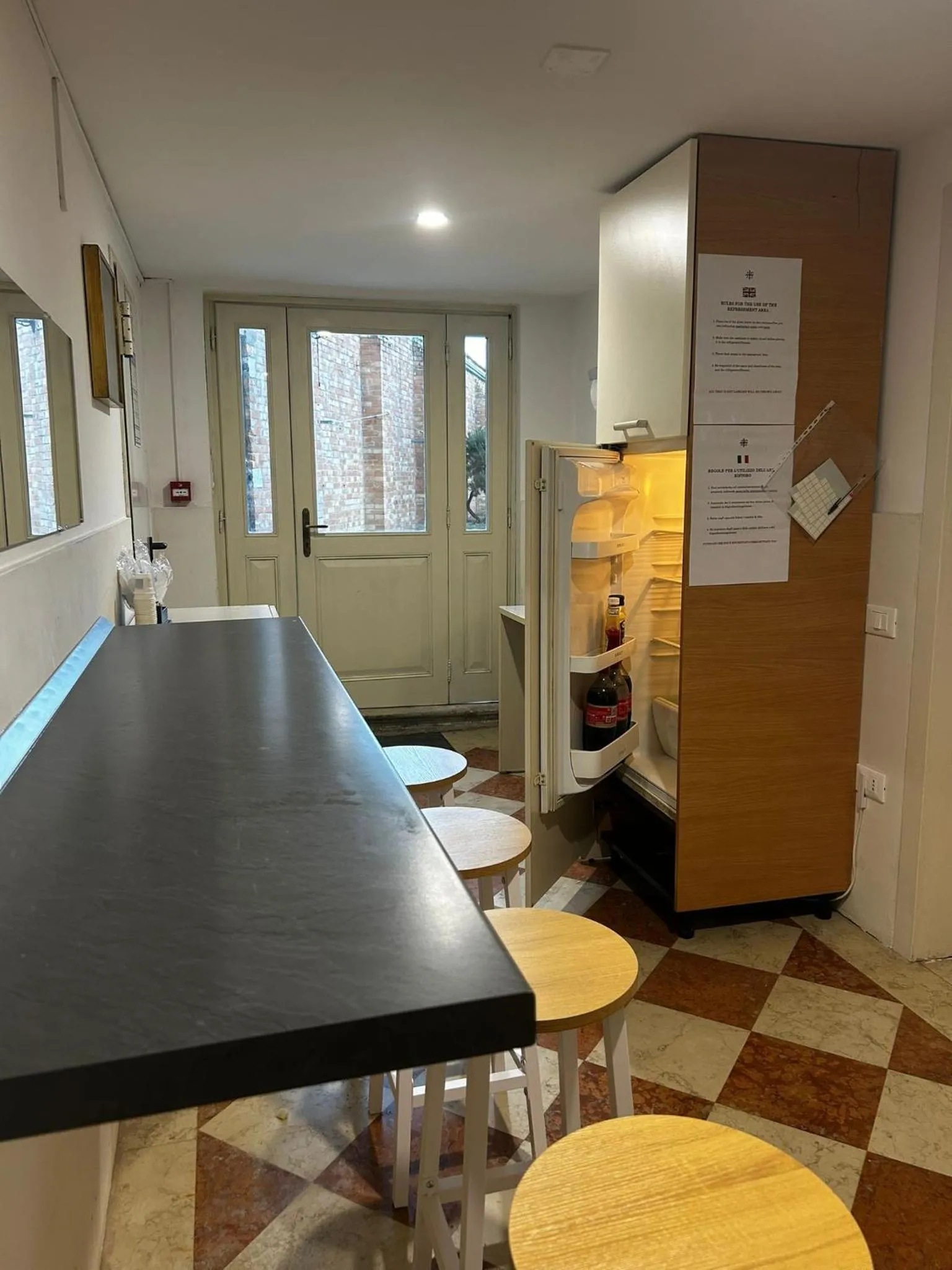 Communal lounge/ TV room in Ostello AMDG