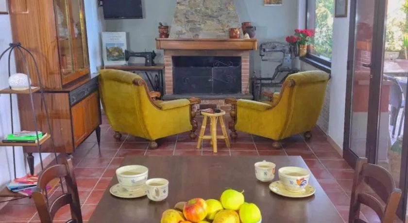Communal lounge/ TV room in B&B Casa te la Bradamante