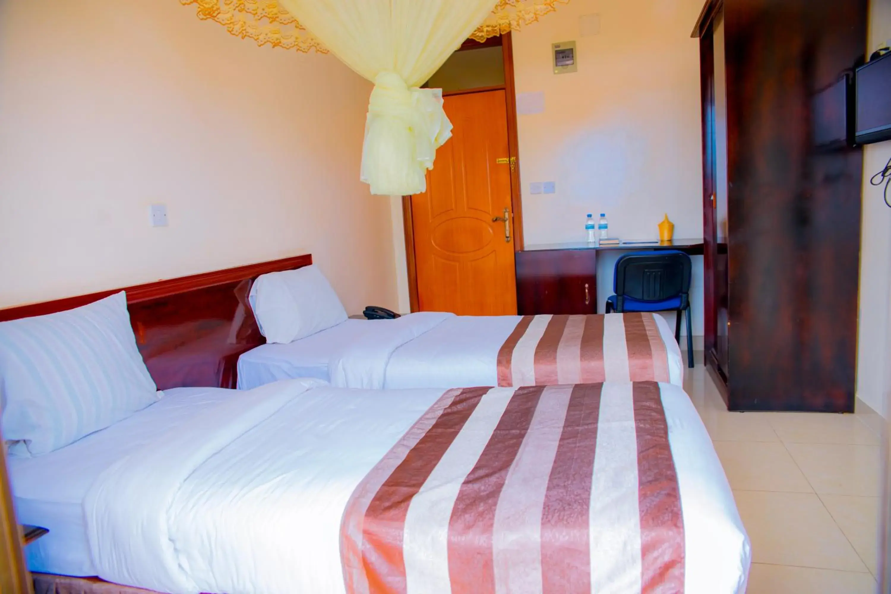 Twin Room with Balcony - single occupancy in Ineza Hotel Musanze - Snow Hotel Twin Room with Balcony - single occupancy in Ineza Hotel Musanze - Snow Hotel