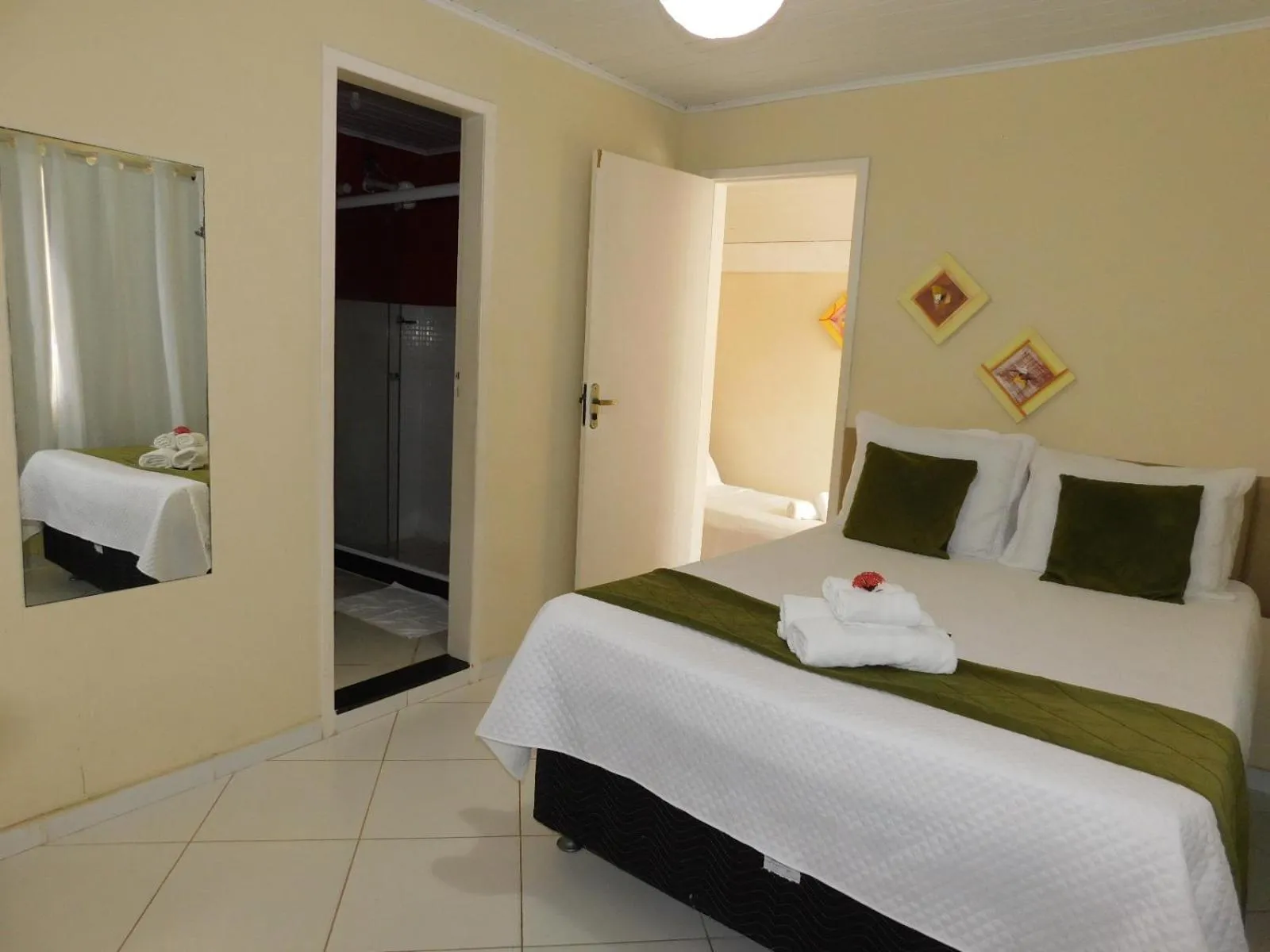 Bed in Pousada Luzes de Geribá