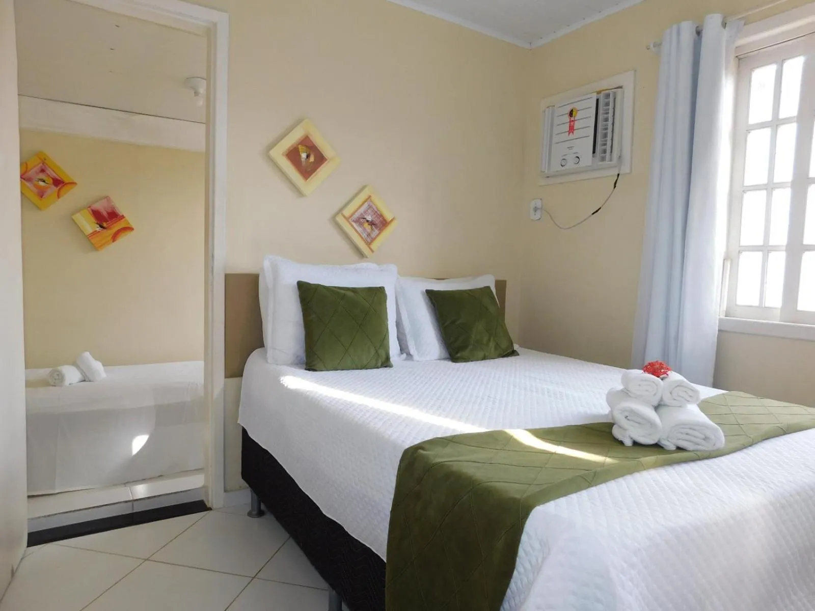 Bed in Pousada Luzes de Geribá