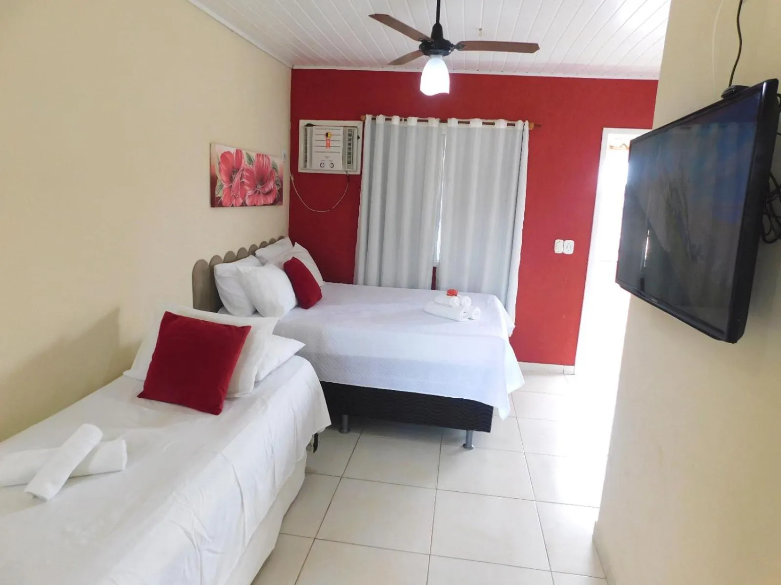 Bed in Pousada Luzes de Geribá