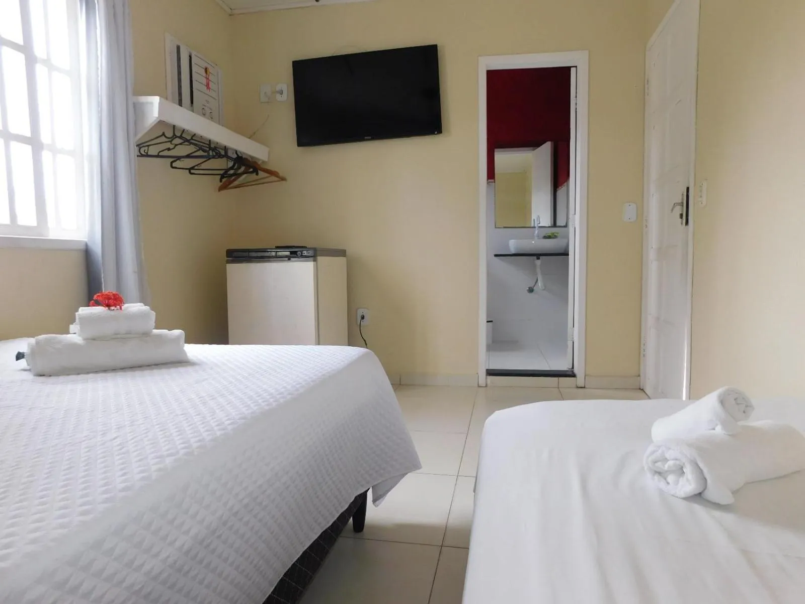 Bed in Pousada Luzes de Geribá