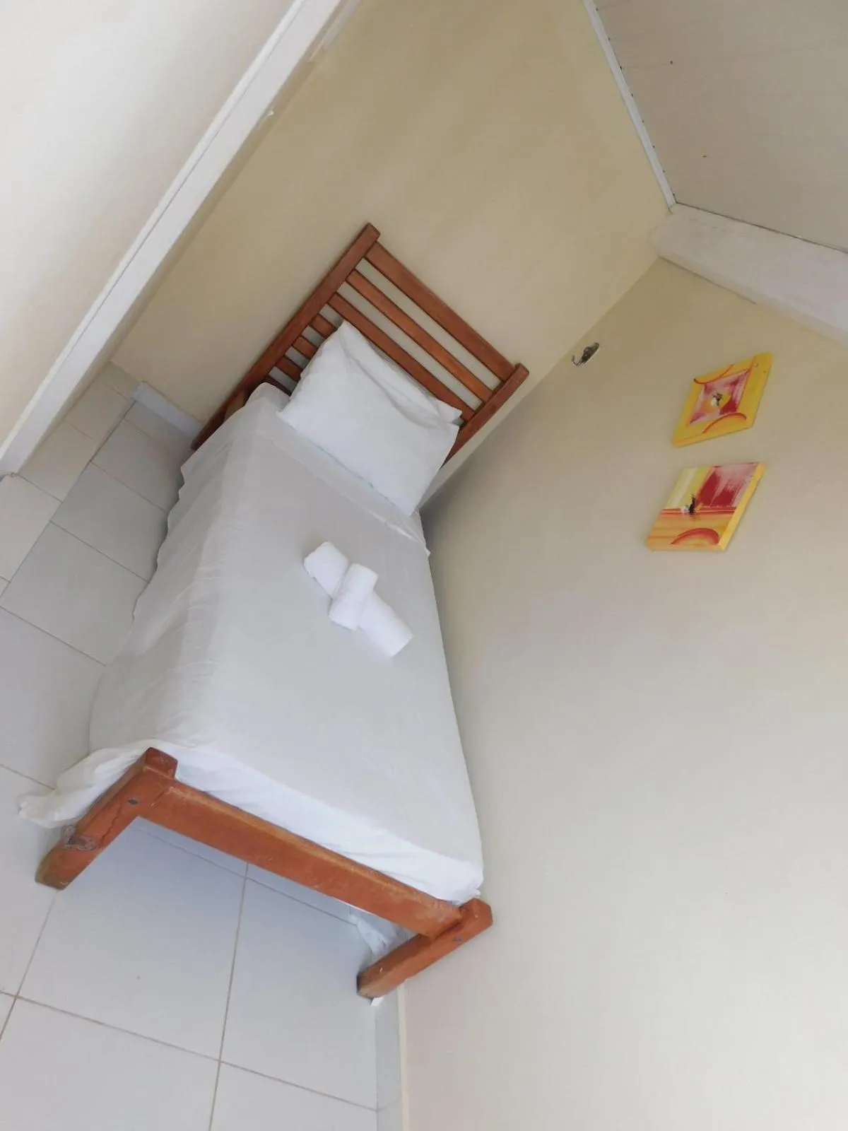 Bed in Pousada Luzes de Geribá