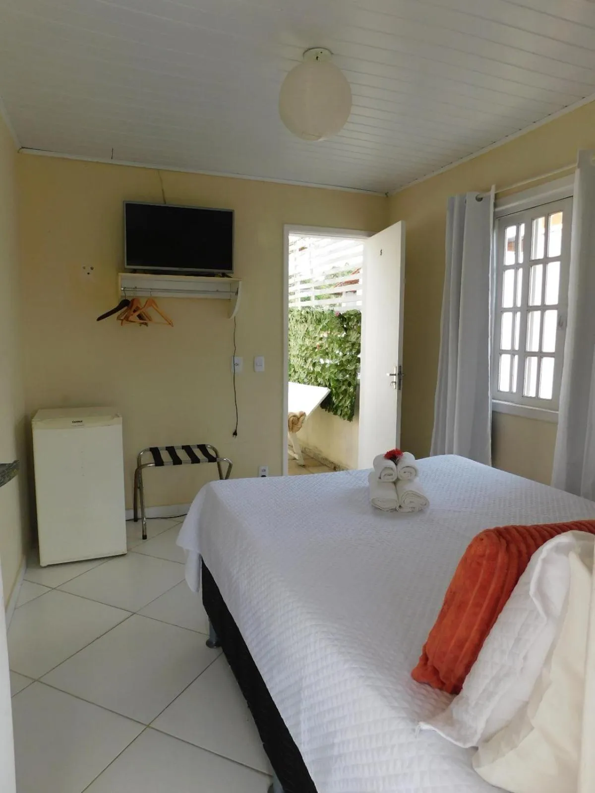 Bed in Pousada Luzes de Geribá