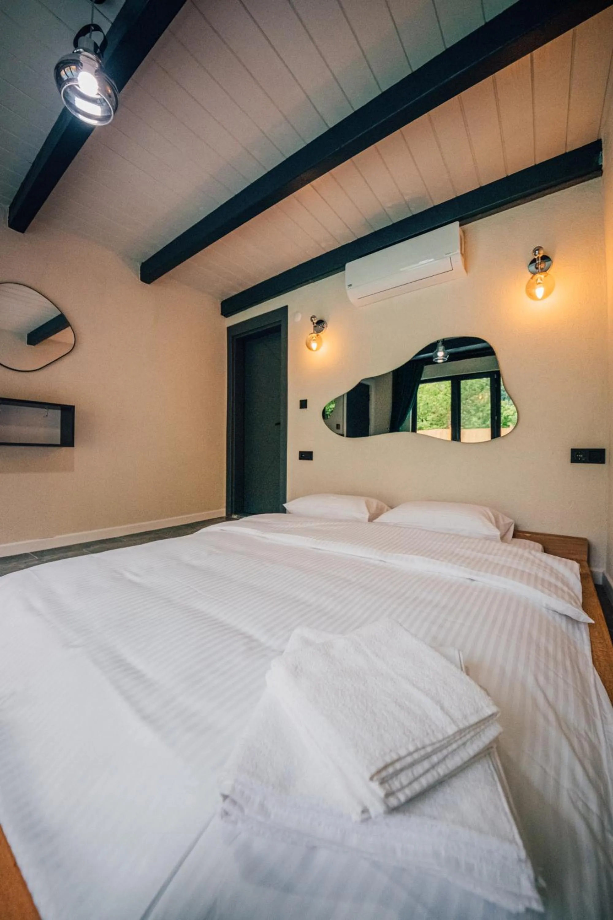 Bed in MoonSA Boutique Villas