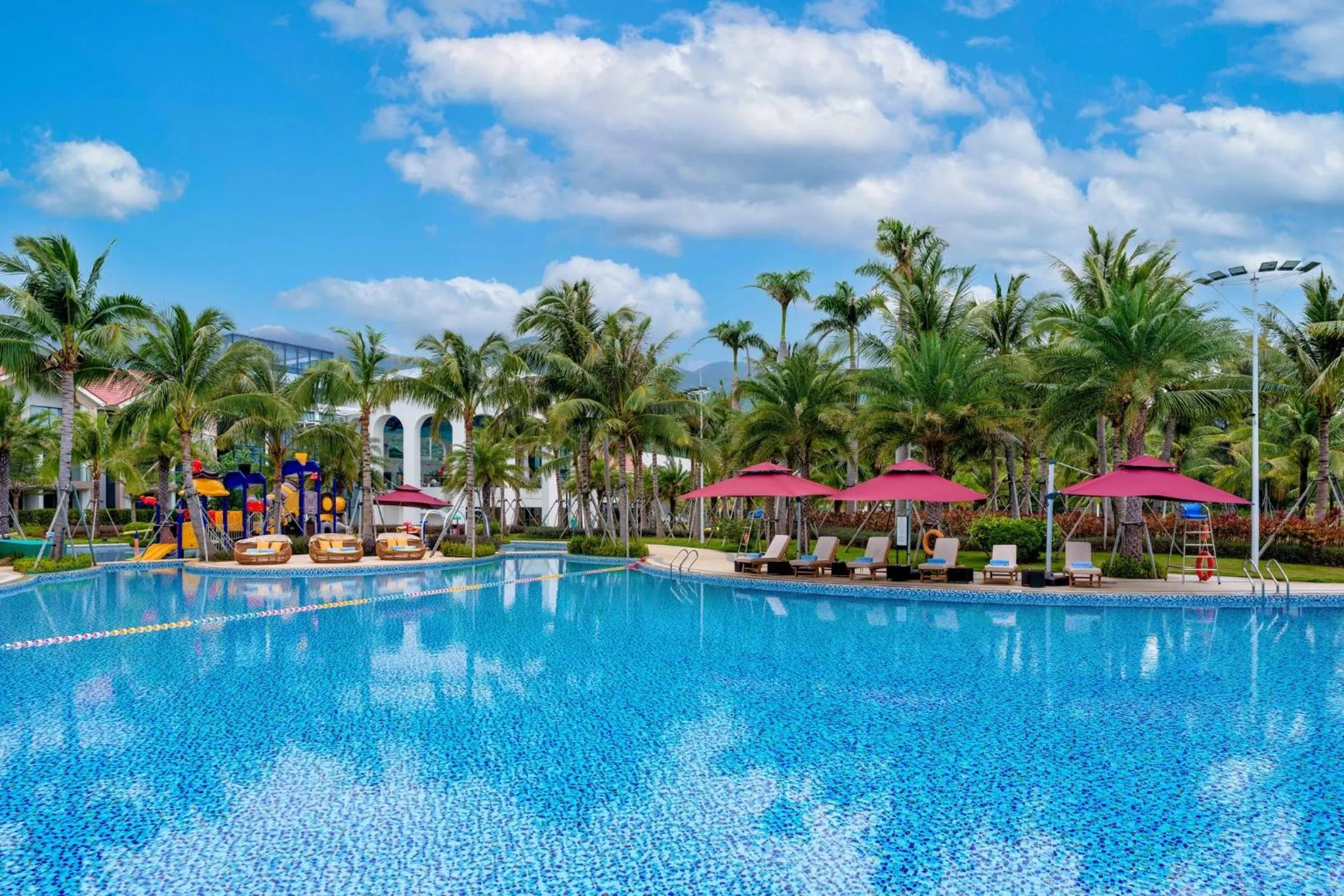Swimming pool in Holiday Inn Hainan Xiangshui Bay by IHG