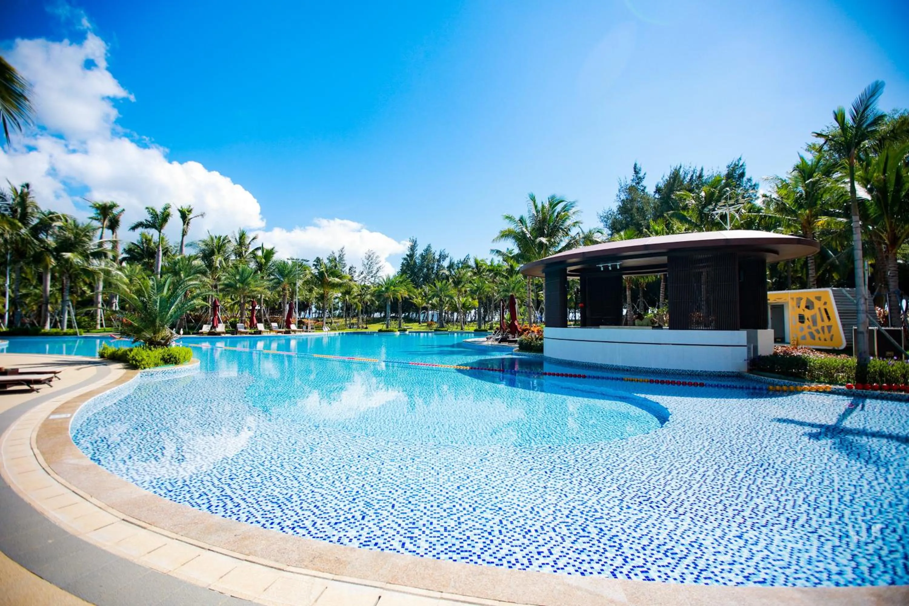 Swimming pool in Holiday Inn Hainan Xiangshui Bay by IHG