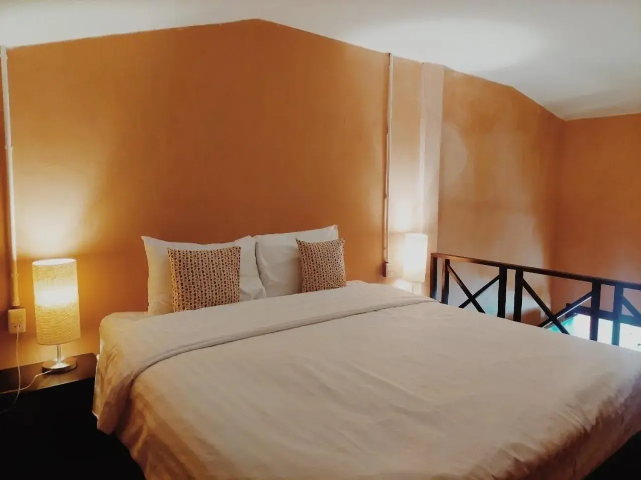 Bed in Retro Box Hotel Chumphon Bed in Retro Box Hotel Chumphon