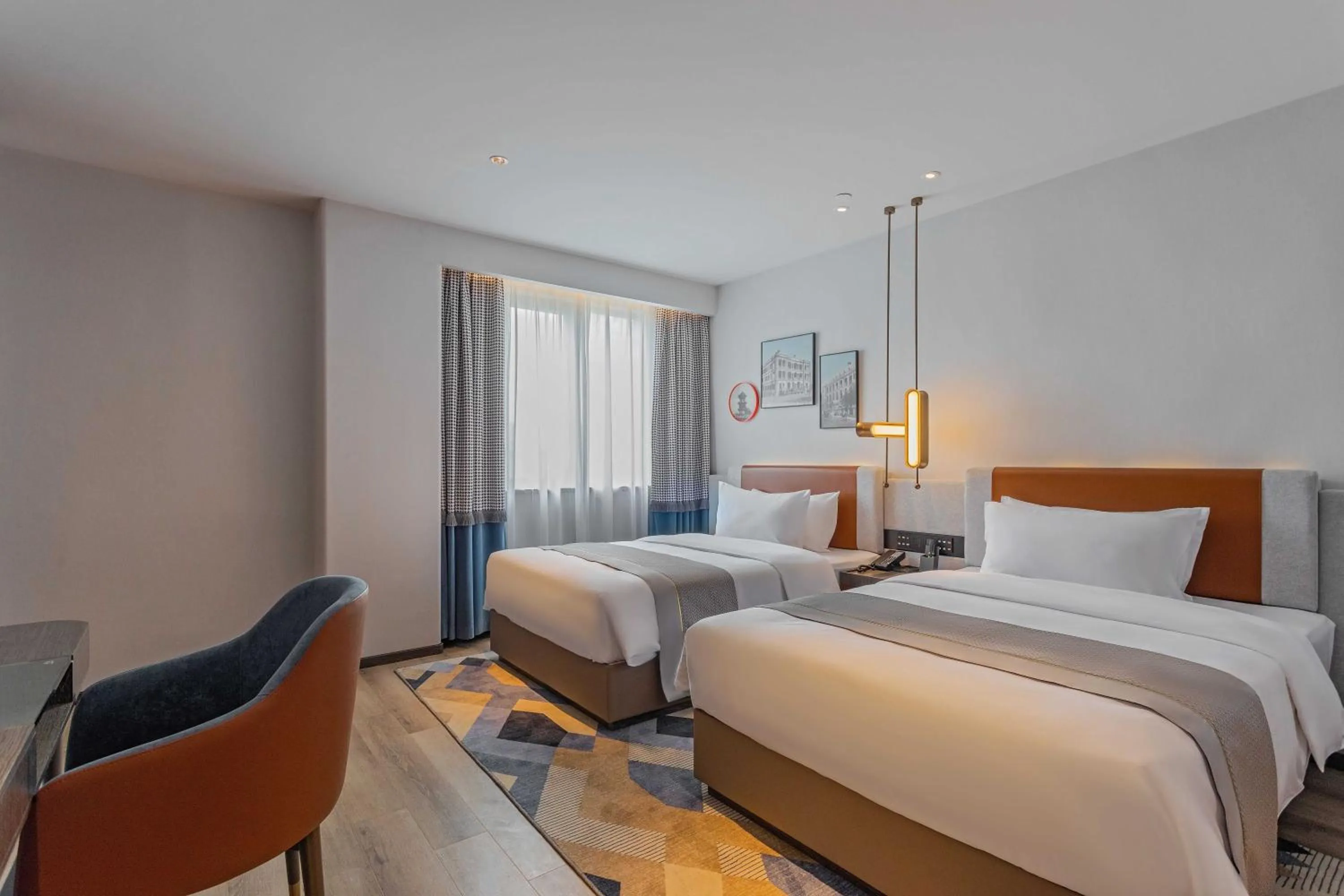 Photo of the whole room, Bed in Grand Madison Wuhan Hankou on the Bund