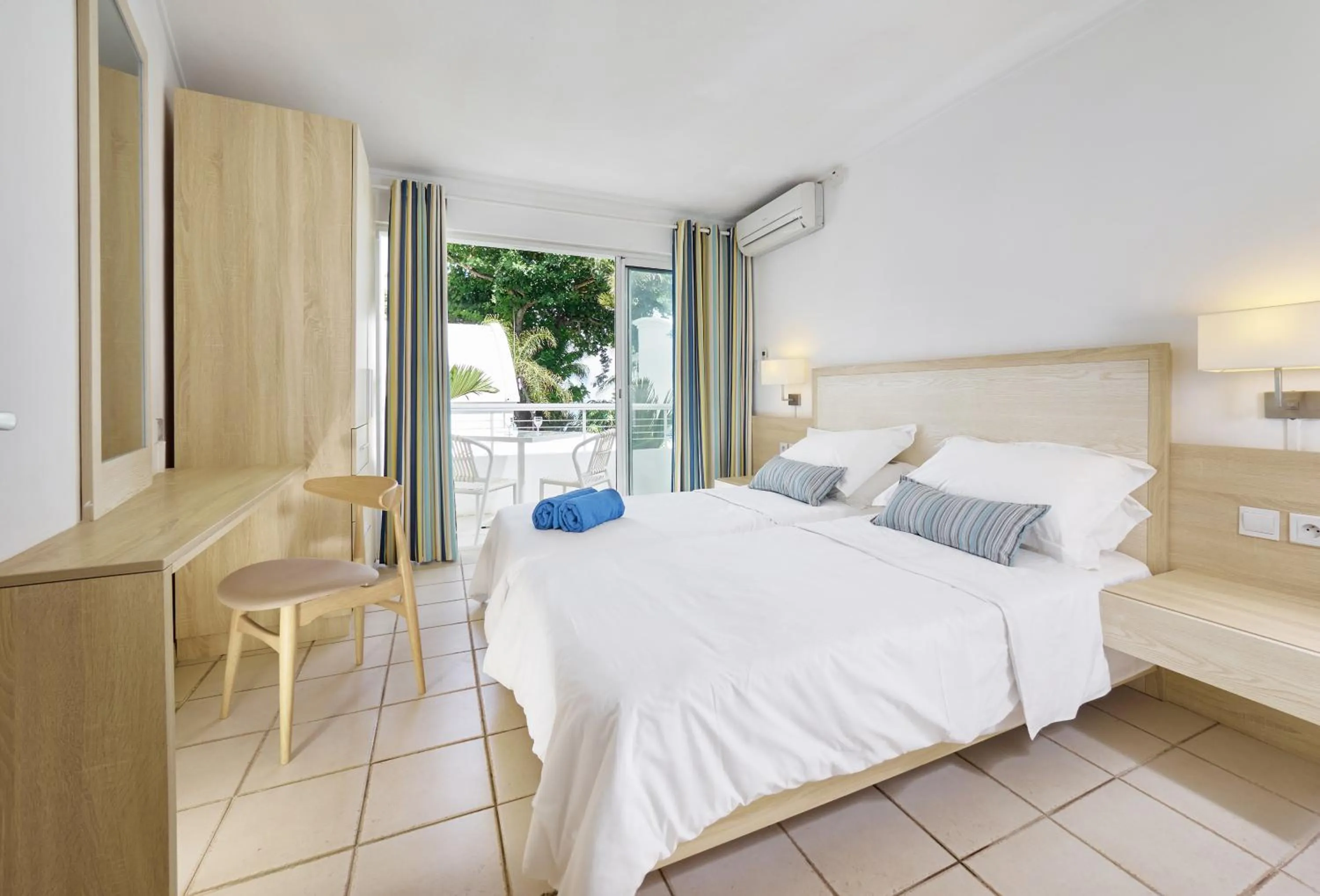 Balcony/Terrace, Bed in Le Beachclub