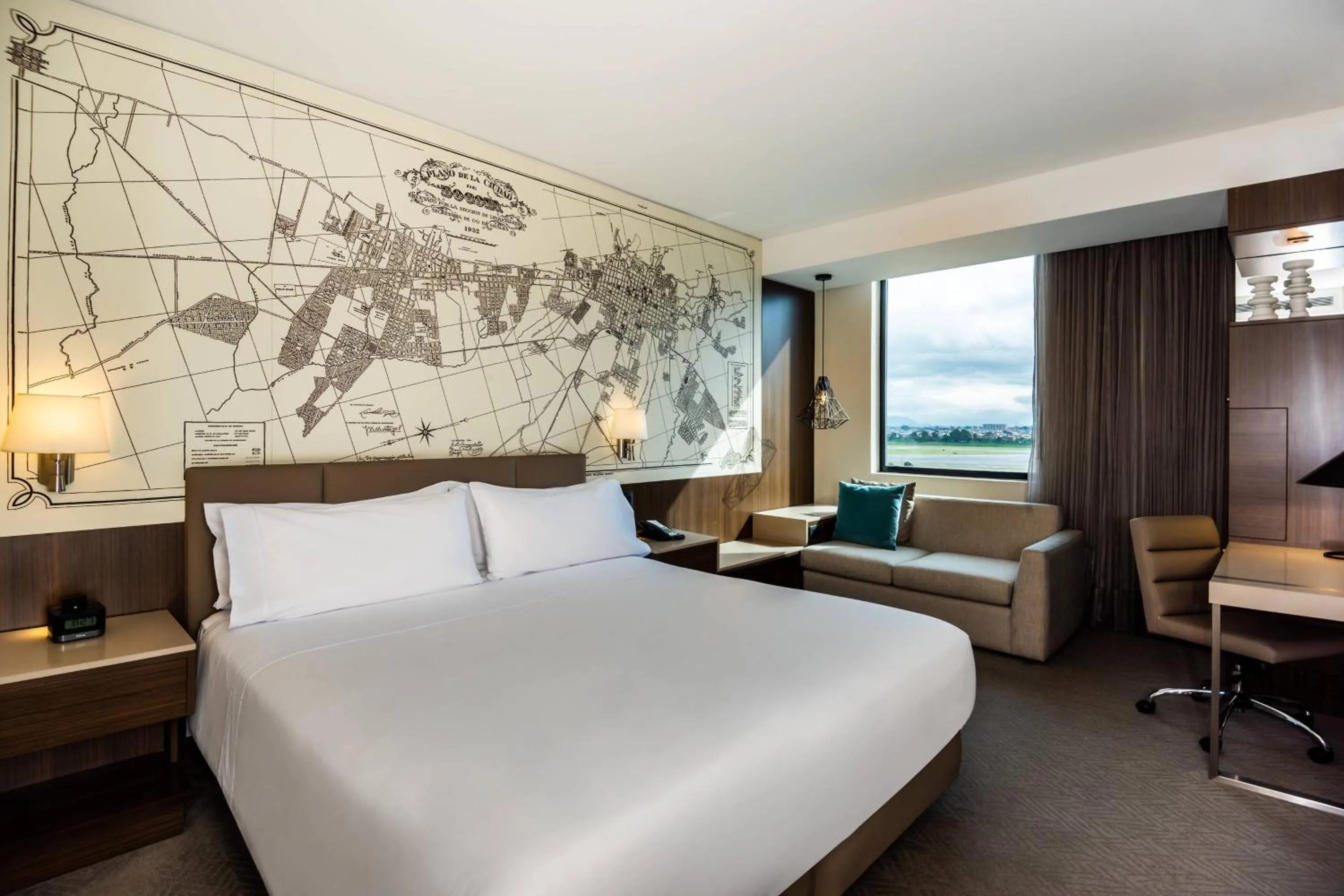 Photo of the whole room, Bed in Courtyard by Marriott Bogota Airport