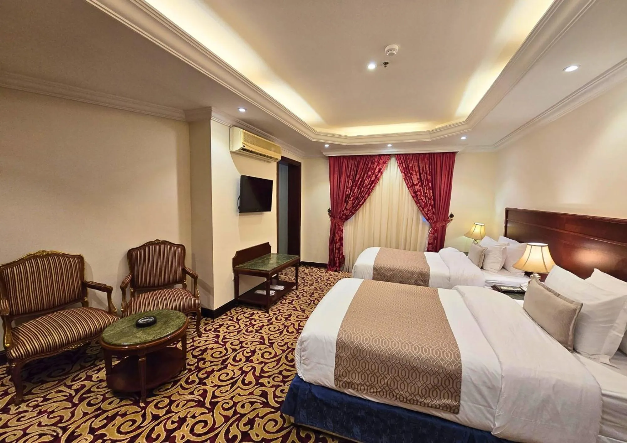 Photo of the whole room, Bed in Taj Celine Hotel