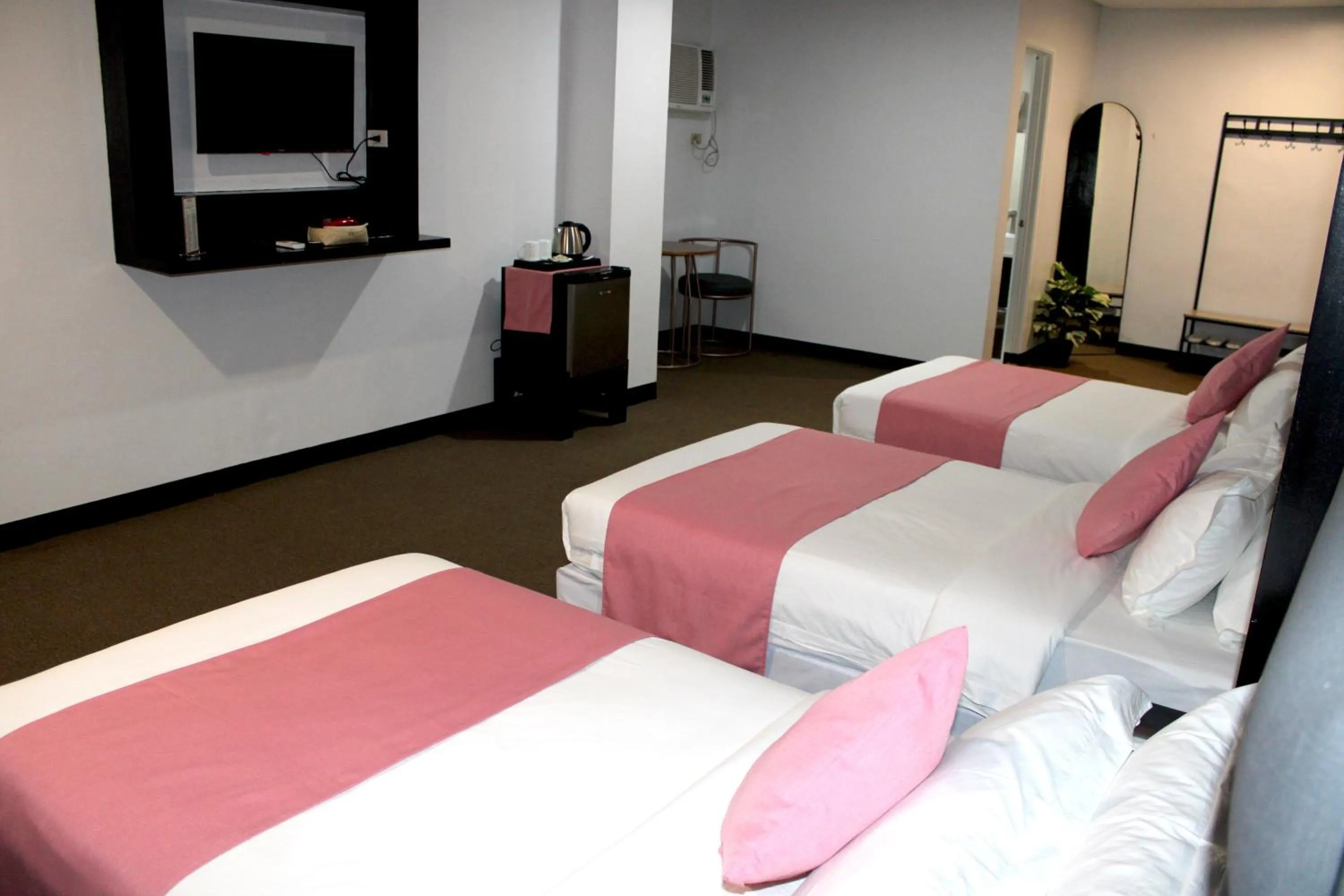 Photo of the whole room, Bed in Dancenter Boss Hotel Near Clark International Airport